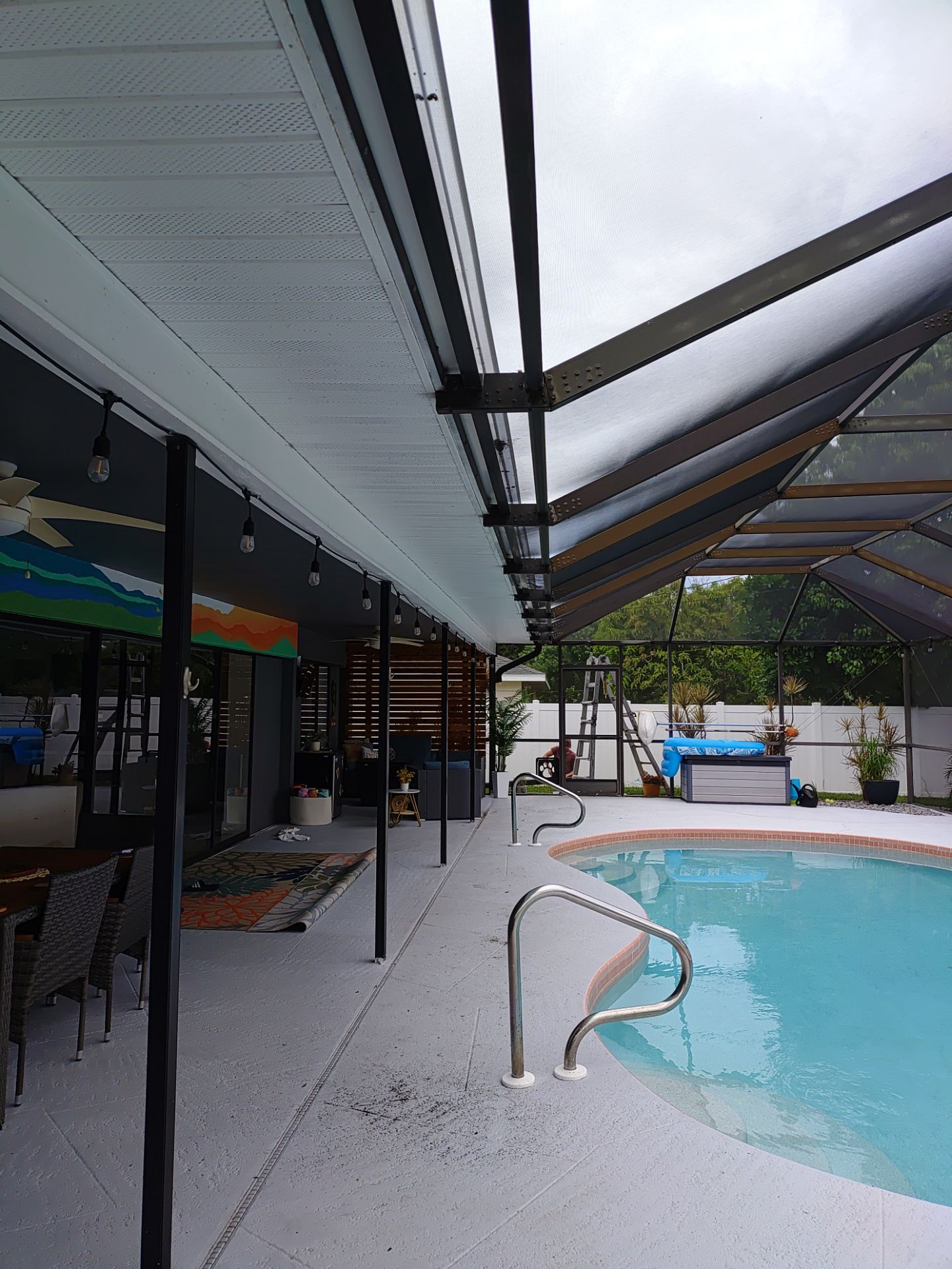 3x4 Downspouts Bronze Installation in Cape Coral FL by Gutter Professors