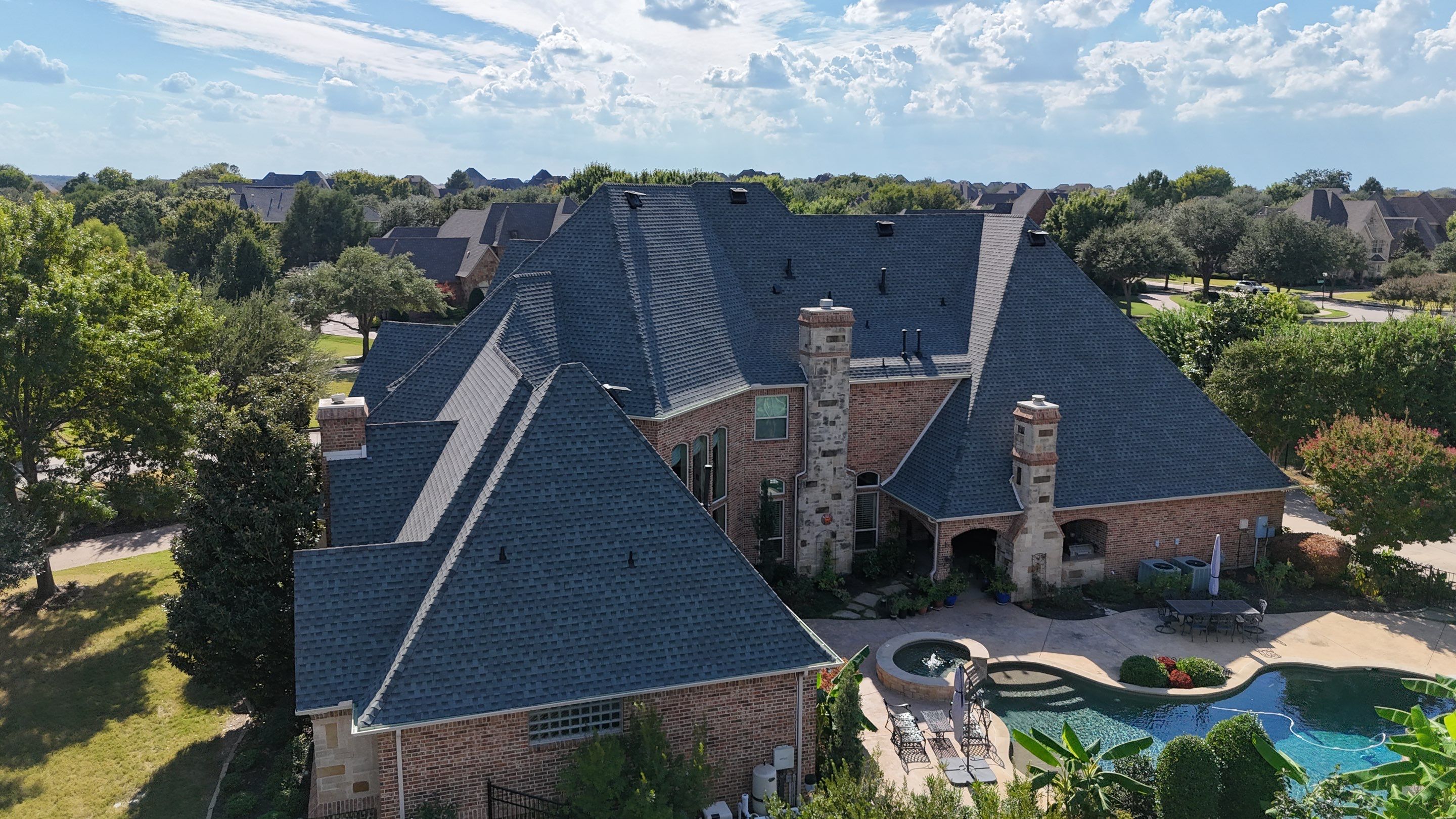 Southlake Texas Estate - Roof, Copper Awning and Gutter Project by First United Roofing & Construction