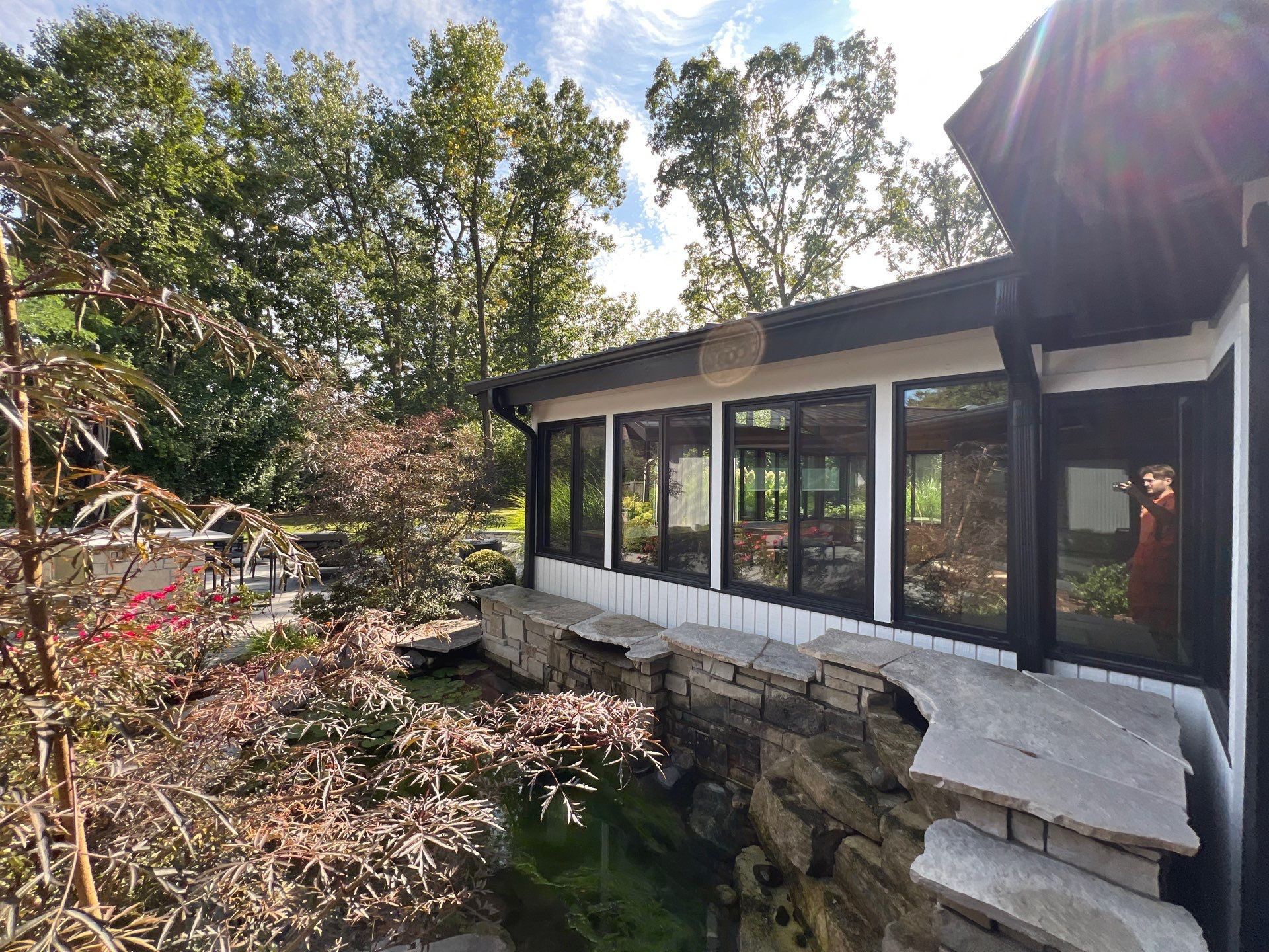 Complete Exterior House, Bluestone & Garage Floor Cleaning by Northern Power Washing LLC.