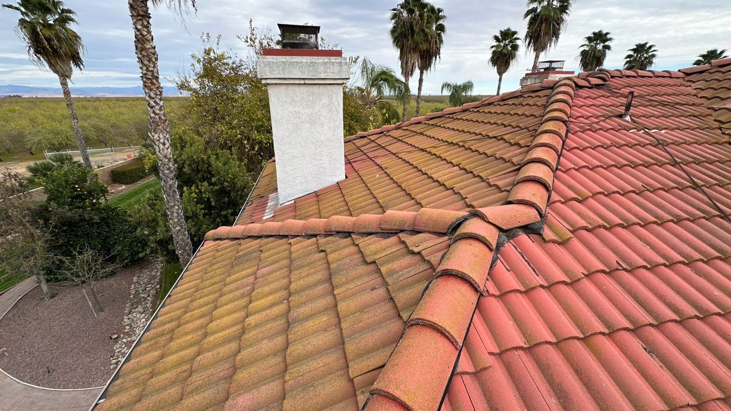 Tile refurbish project using existing tiles and replaced underlayment and battens by Straight Edge Roofing Inc