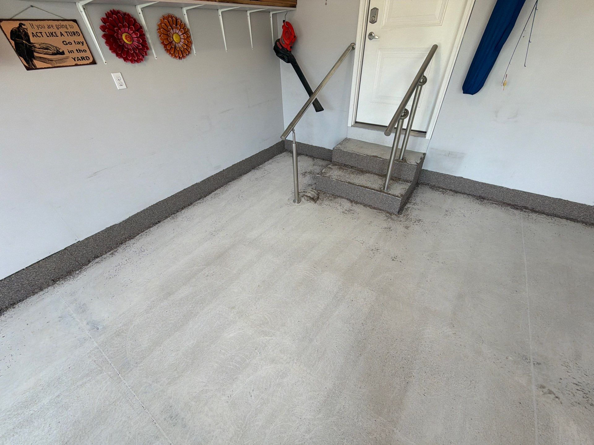 Garnet Polyaspartic Flake Garage Floor Installation in Zeeland by Gordon Painting