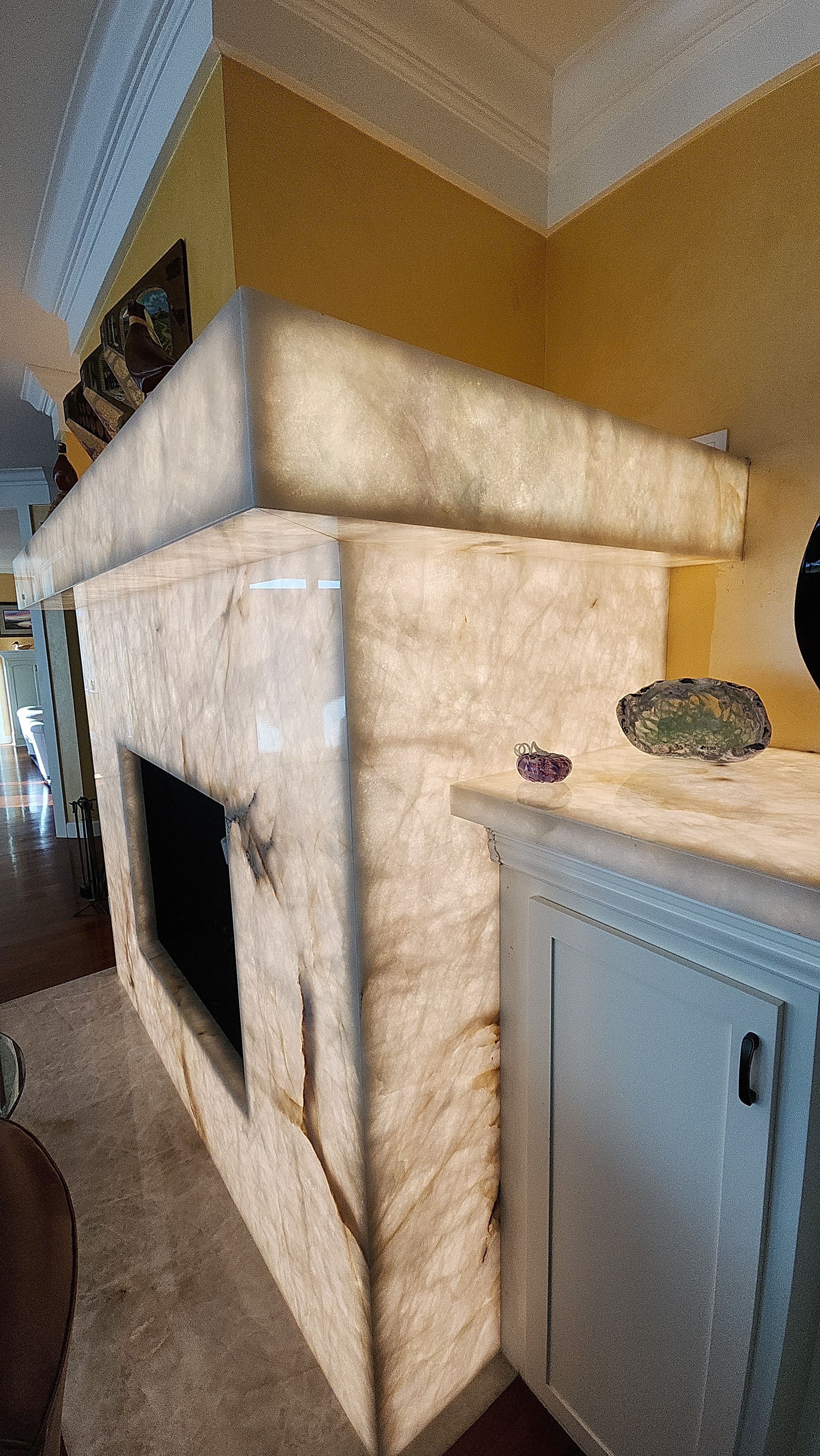 Backlit Stone On A Fireplace by S.Y. Electric Inc.