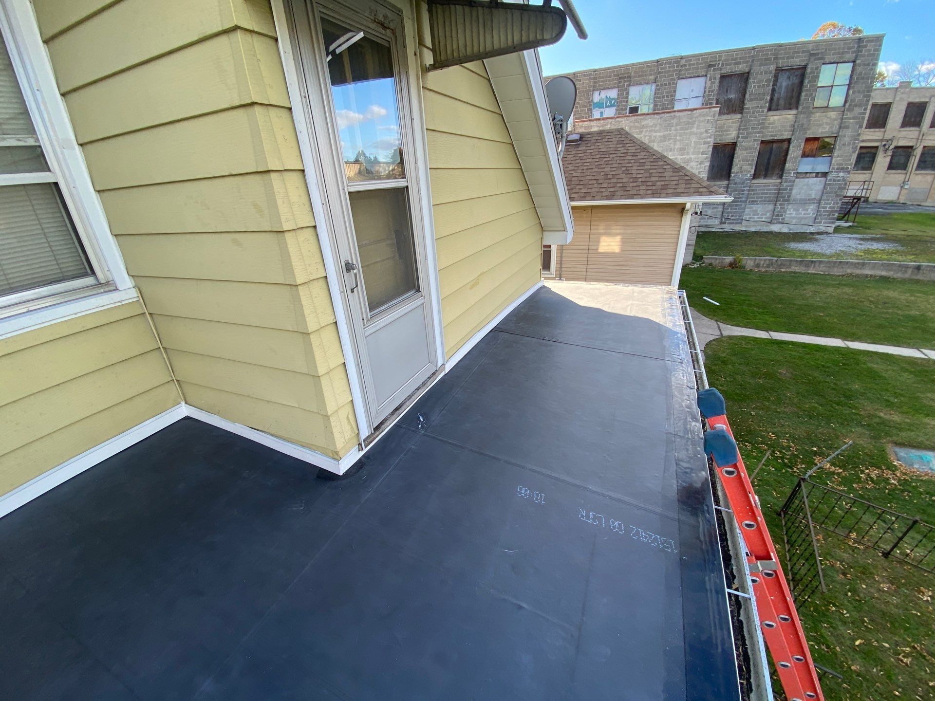 Flat Roof Porch with 60mil EPDM Rubber by Gellings Roofing & Siding