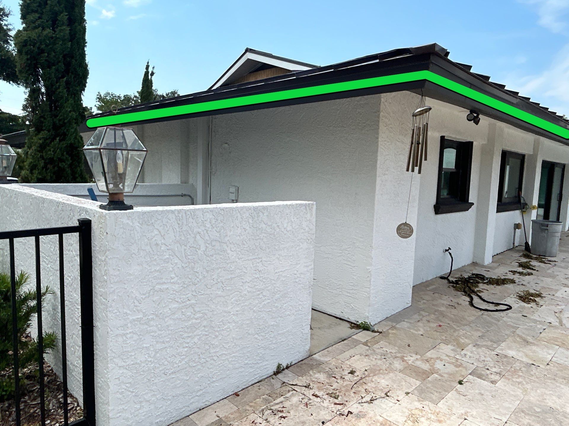 Black Seamless Gutters and Downspouts in Siesta Key FL by Gutter Professors