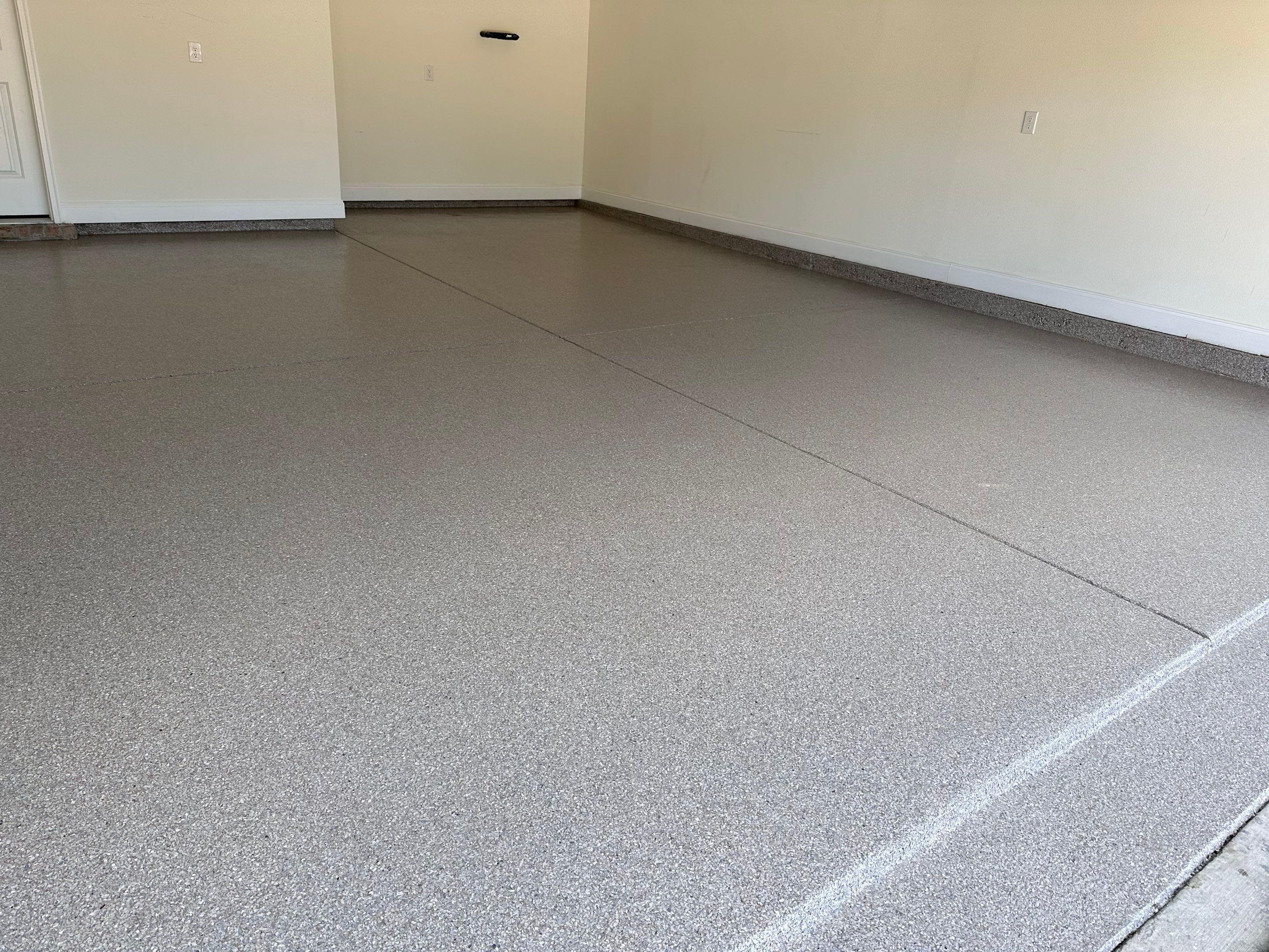Epoxy Flake Garage and Patio Floor Coating in Cantonment, FL by Cornerstone Hard Surface Restoration 