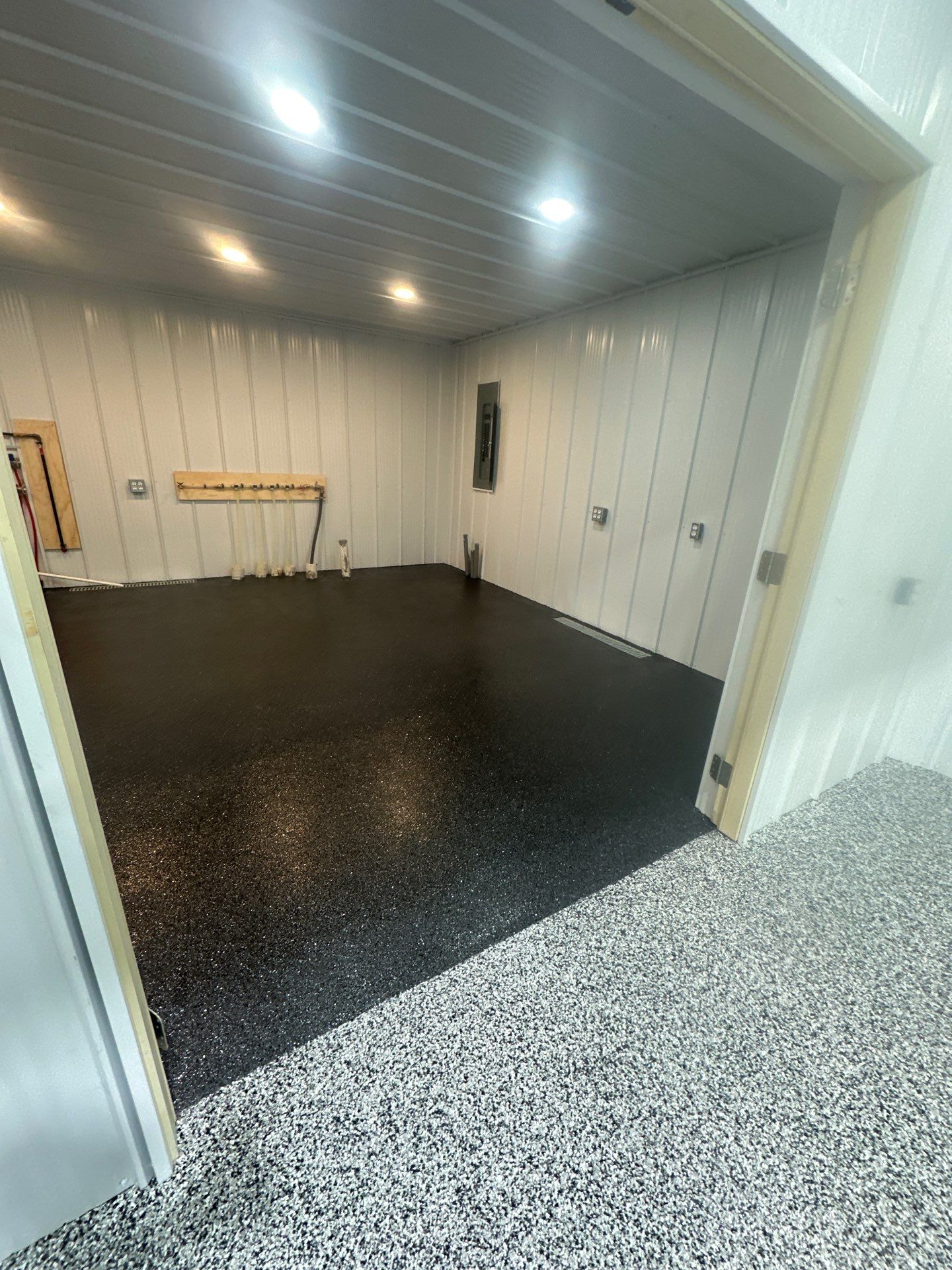 Barndominium Flake Coating using Polyaspartic by Revival Concrete Coatings