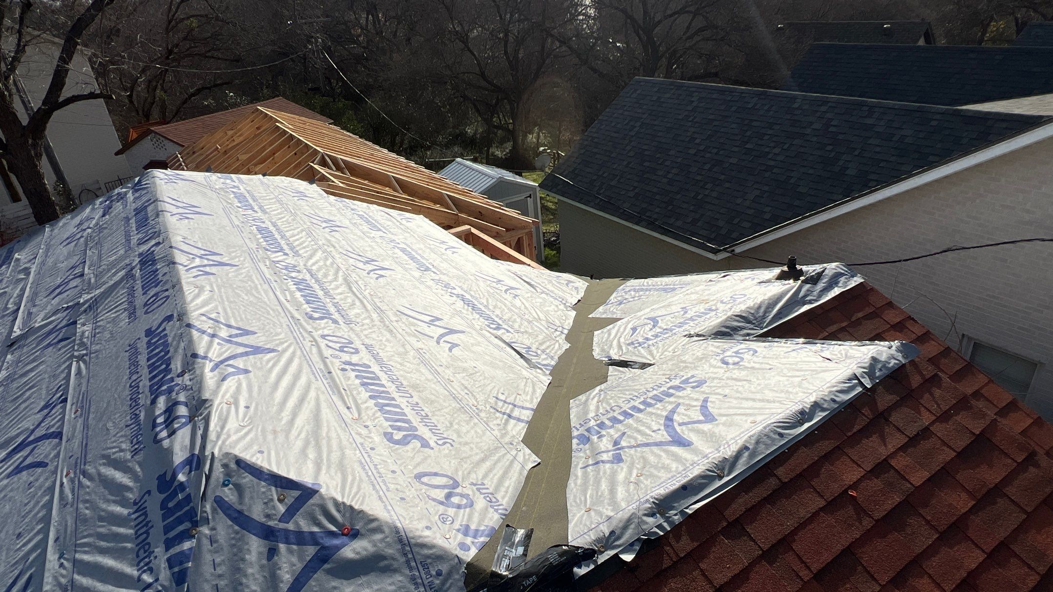 Residential Roofing Installation using Matching Roof Shingles by Harvey Roofing & Construction