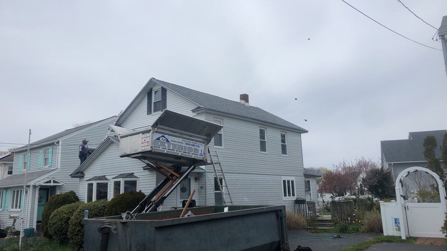 Residential Roofing Installation using Owens Corning Duration Slatestone Gray by A Plus Exterior