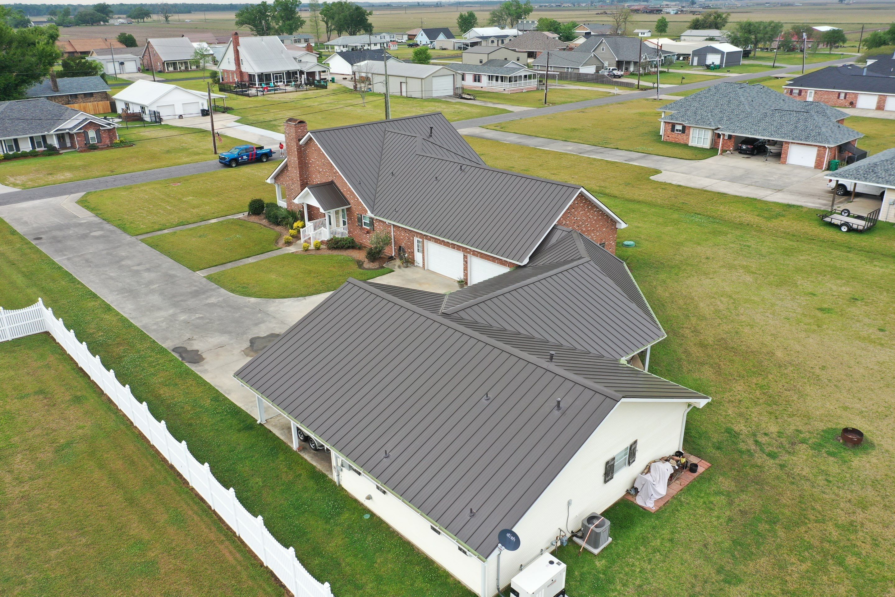 Standing Seam Metal Roof Installation by Top Team Roofing & Construction