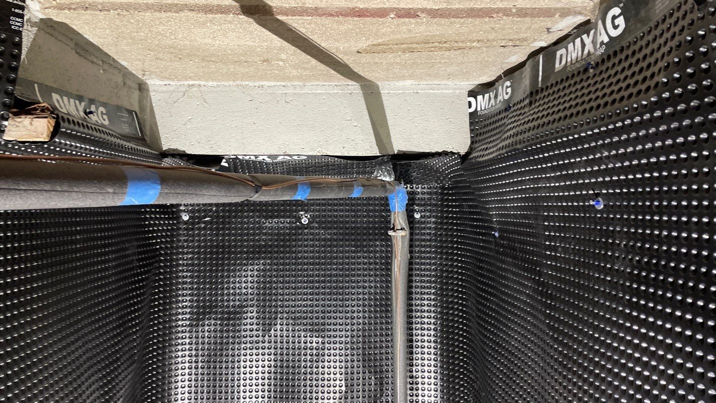 Interior Drain Tile & Sump Pump System in West Minneapolis by Waterproofing Northeast