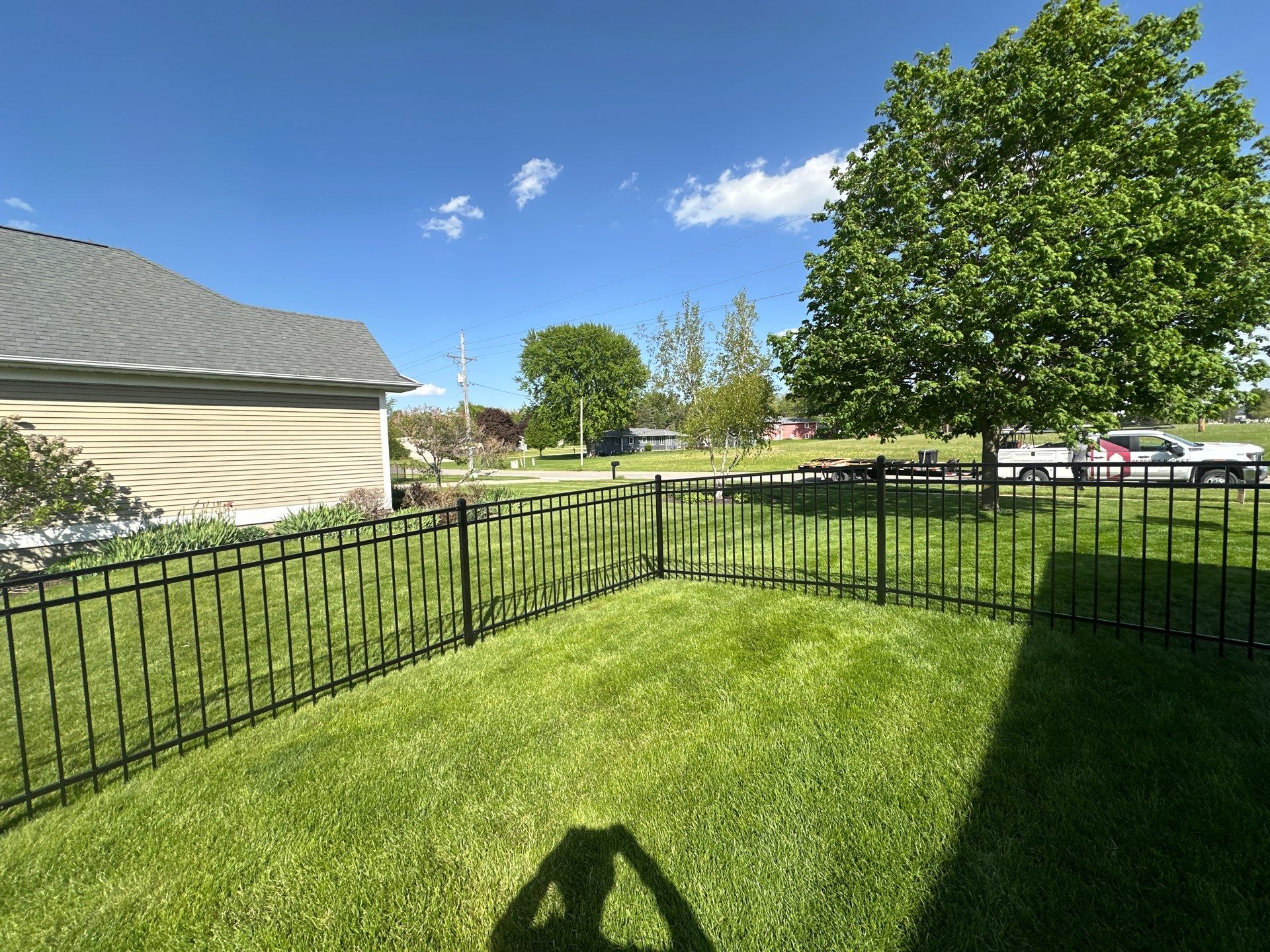 Black Ornamental Metal Picket Fence Installation in Waterloo by Perfect Picket Fence and Stain