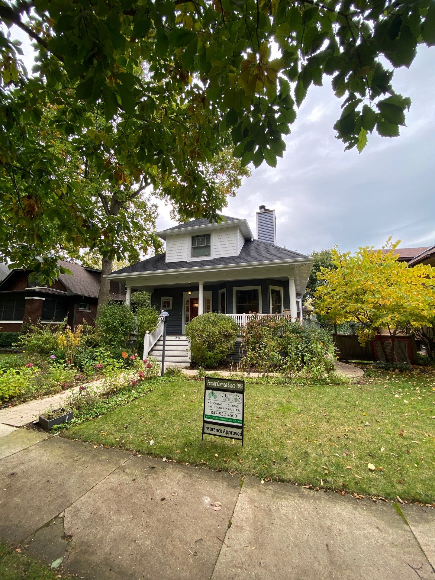 Asphalt Roof, Vinyl Siding, and Aluminum Gutter Replacement by Custom Installations