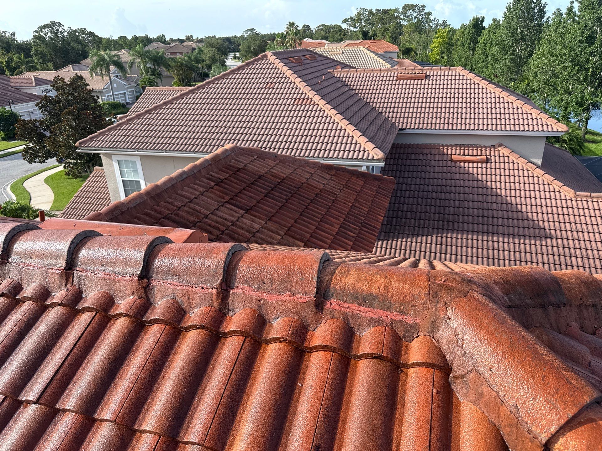 Soft Wash Tile Roof Cleaning in Sonoma Community, Sarasota, FL by Sunshine AquaWash