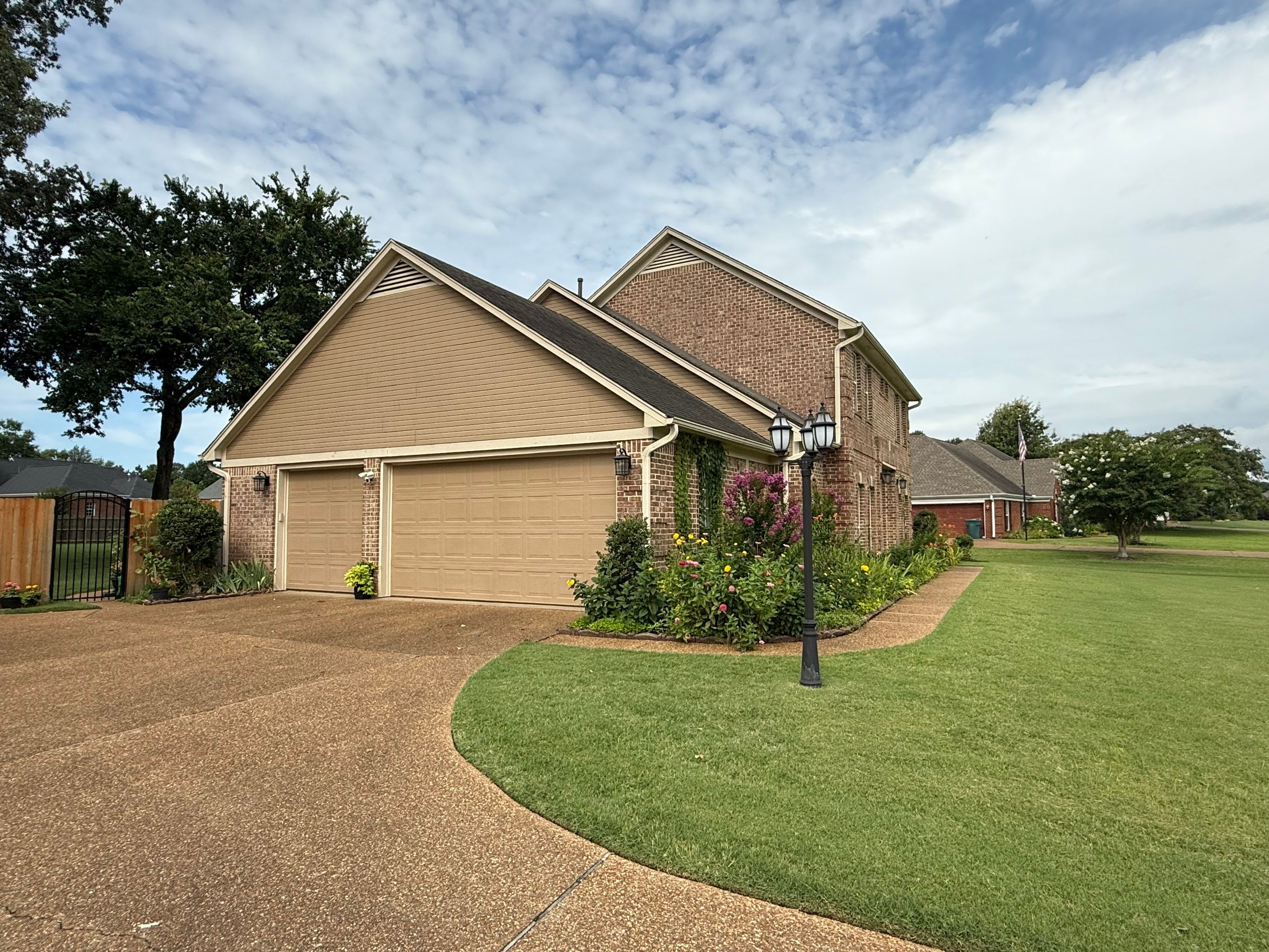 Full Residential Roof Replacement for Southaven Brick Colonial Home by Revival Roofing Services