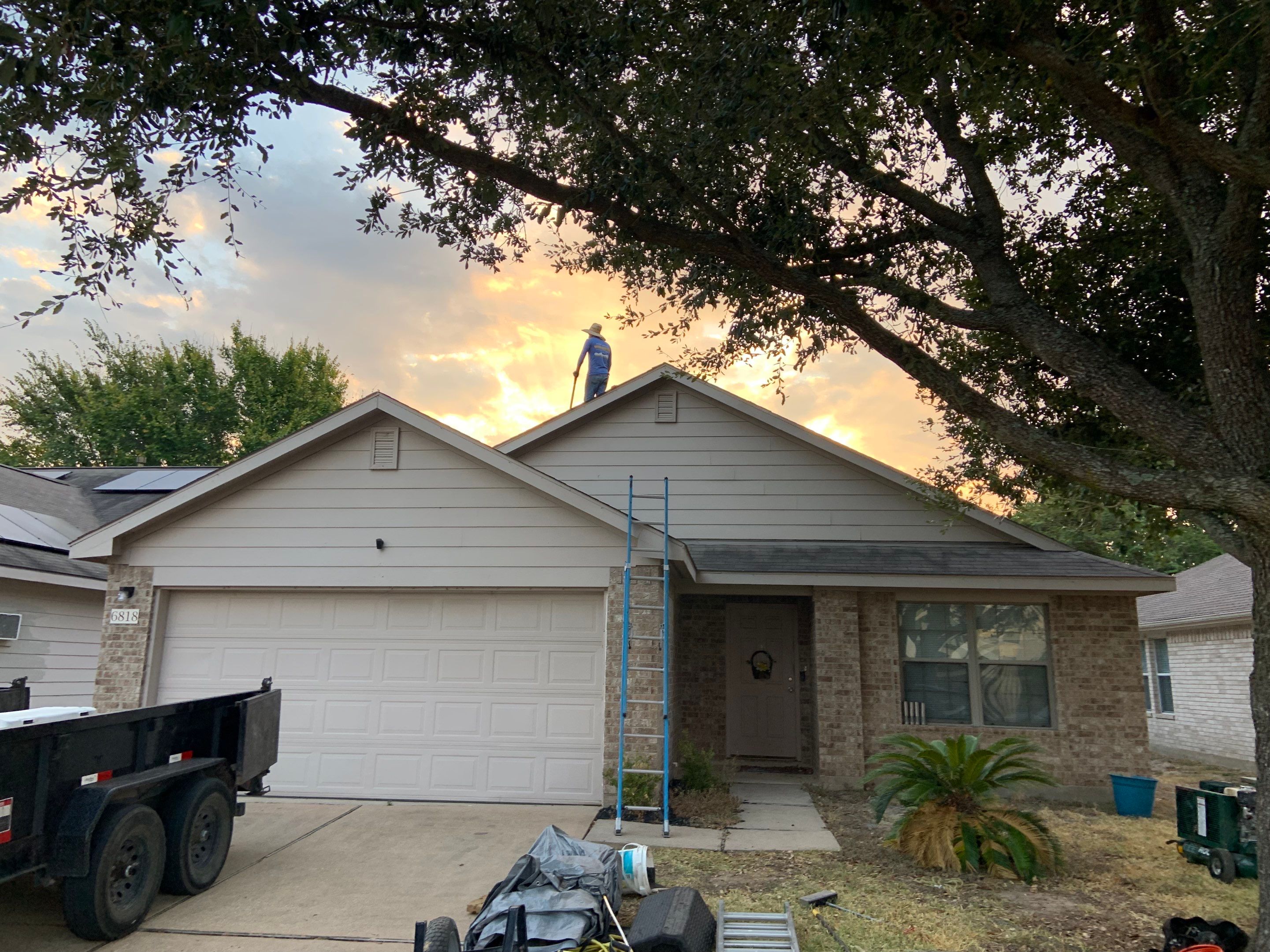 AMIG approved this roof for wind damage, fascia painting, and window work. by Roof Repair Company