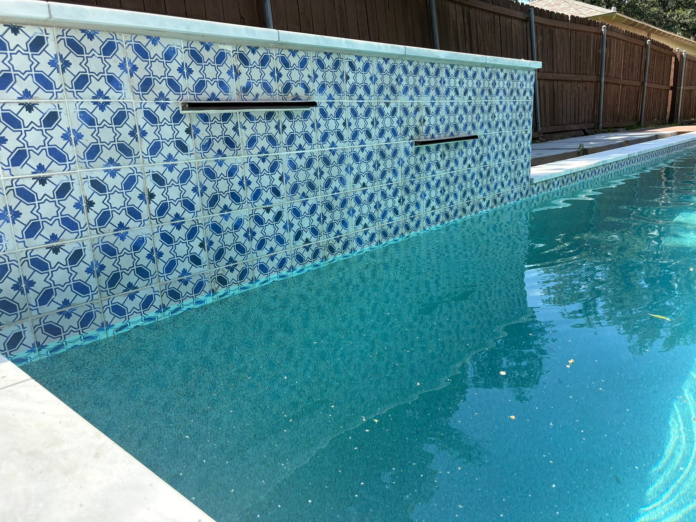 Modern Plunge Pool with Tiled Sheer-Descent Water Wall by Pinnacle Pools and Spas - DFW