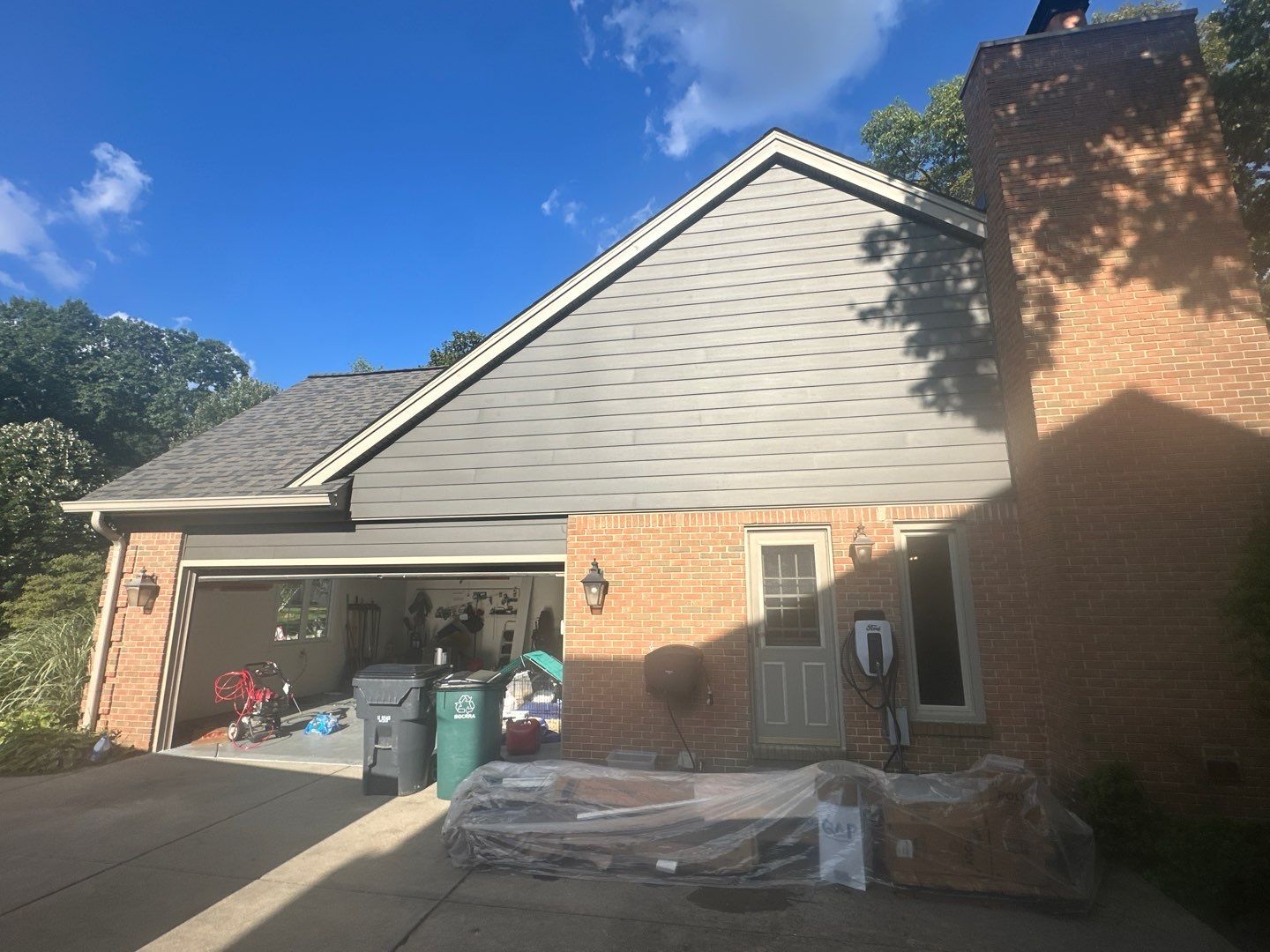 Roof Replacement using Owens Corning Peppercorn and Siding Replacement using Ascend Charcoal Smoke by 180 Contractors