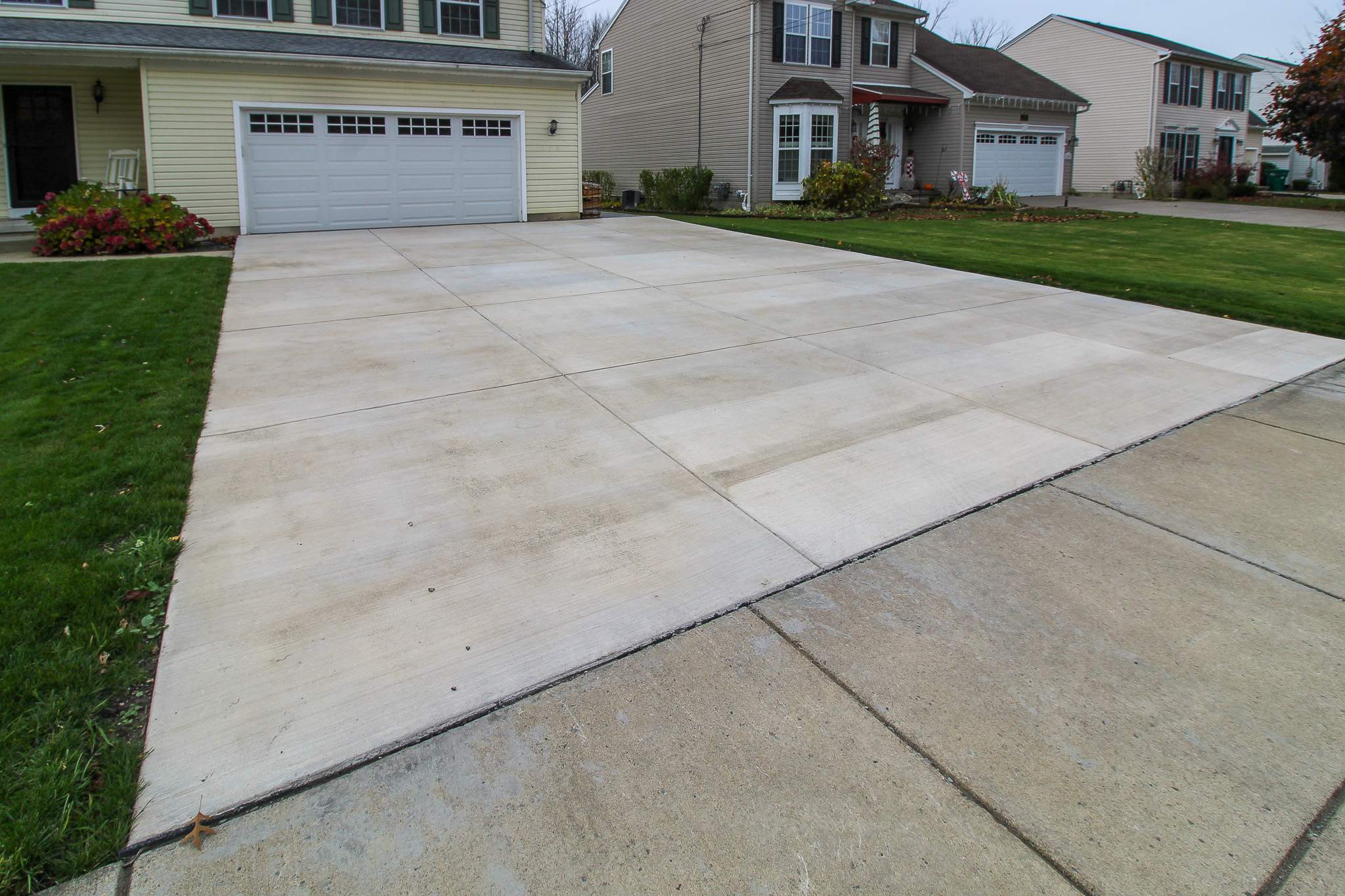 Stamped Concrete, Entry Door, and Concrete  by Ivy Lea Construction