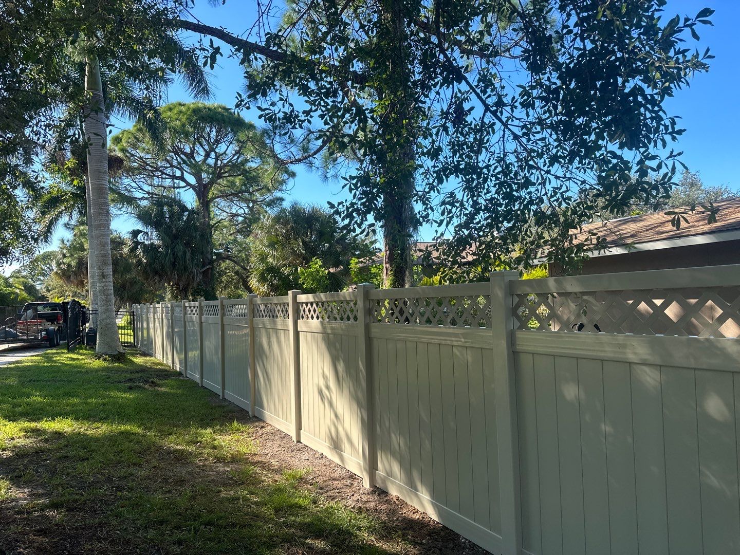 Vinyl Fence Installation using 6Ft Tan Vinyl Privacy Fence with Lattice Top by Asap fence and gates, LLC