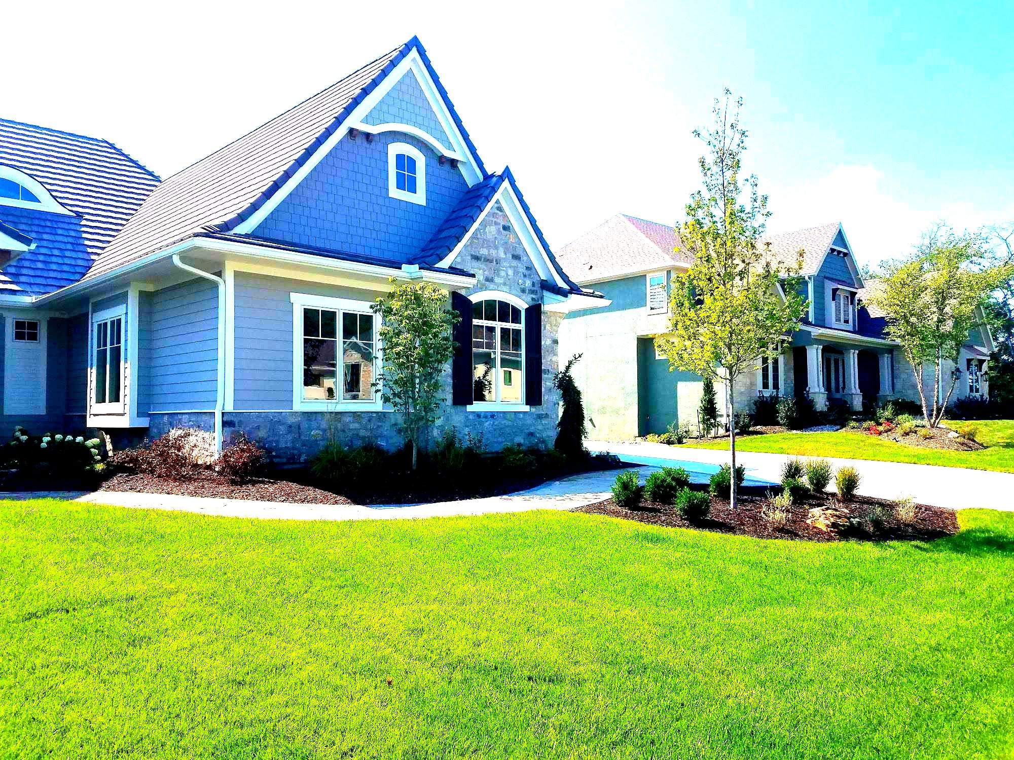 Front Yard Landscape and Walkway Renovation in Overland Park by LAND ESCAPES LLC