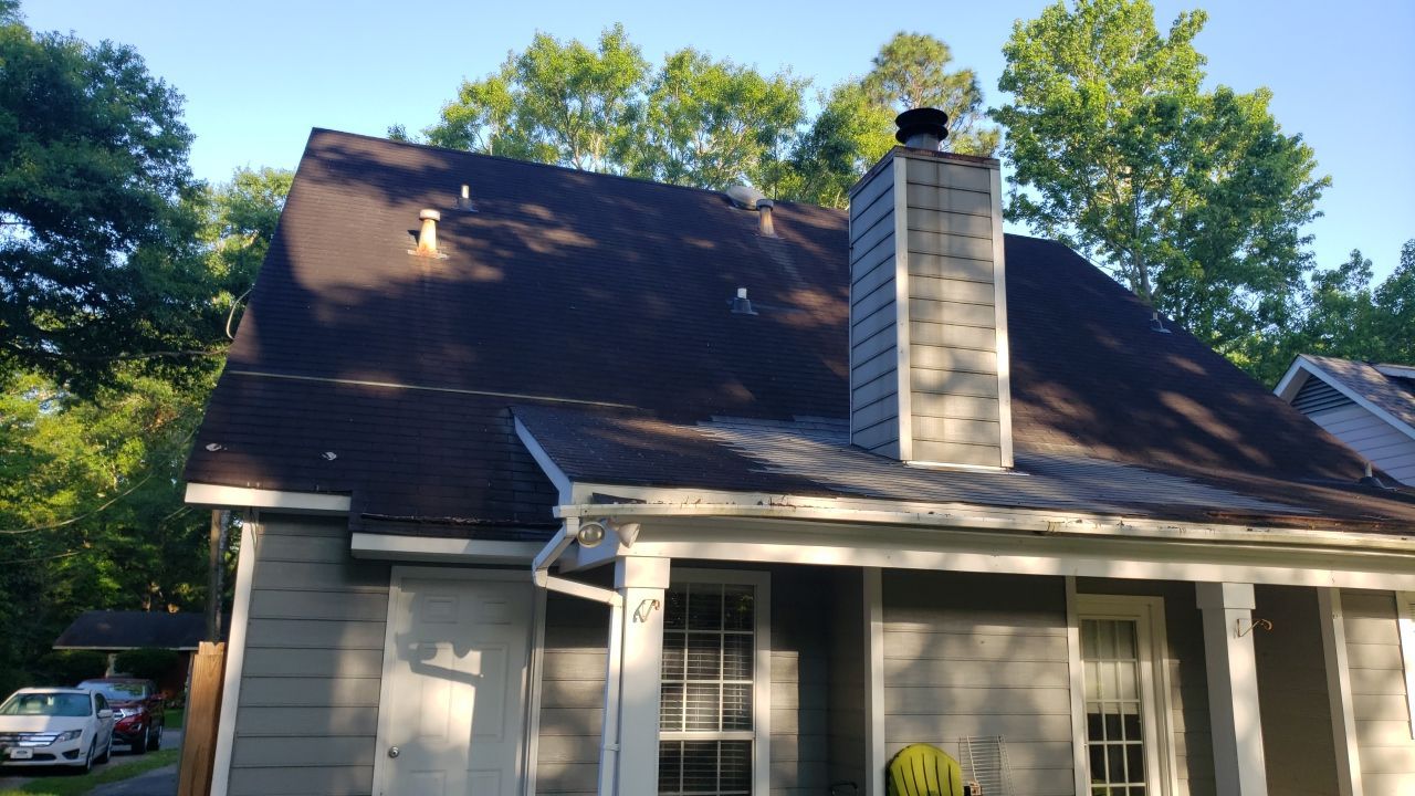 Residential Roofing Installation using Roof Replacement by American Roofing & Construction LLC
