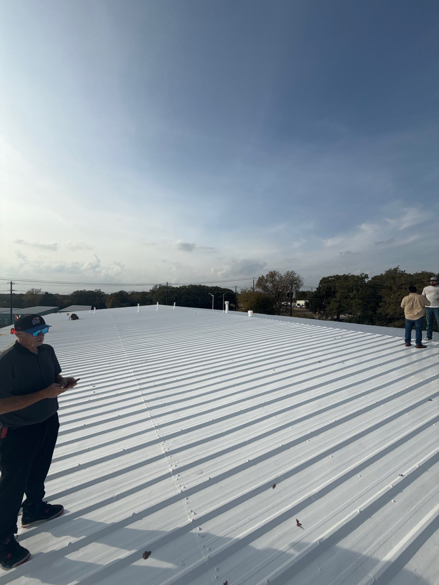 Silicone Coating Metal Rehab by First Out Roofing 