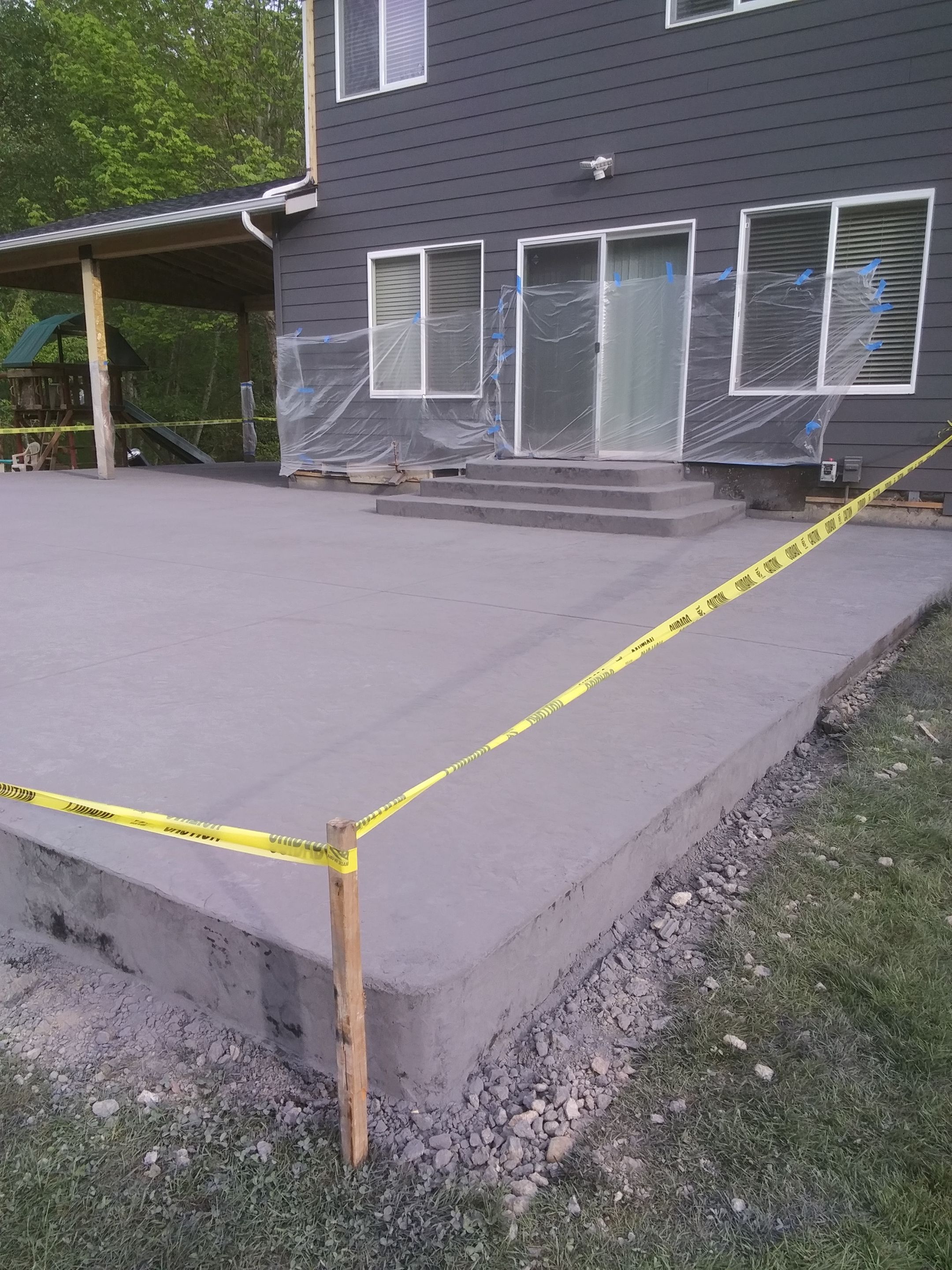 Ty | Concrete Patio by Jireh Asphalt & Concrete Inc 