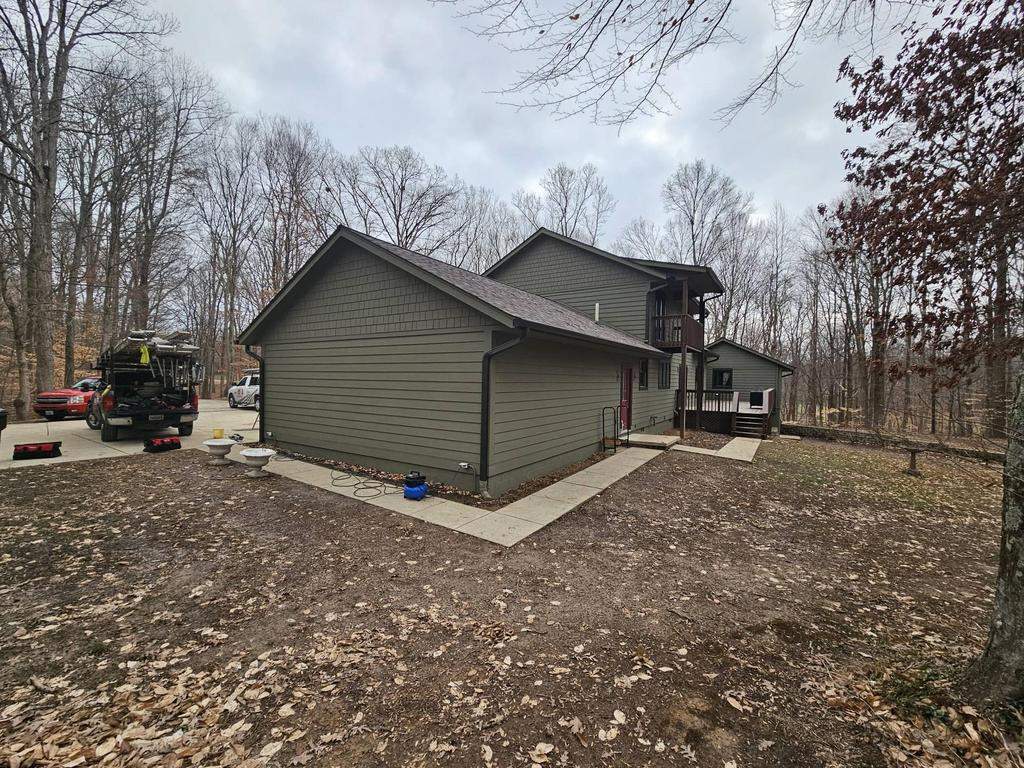 Siding Installation using Primed James Hardie & Straight Edge Shakes by Koontz Construction