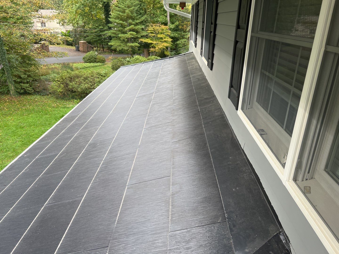 Tesla Solar Roof Replacement using Tesla Solar Roof V3 Tiles by American Home Contractors