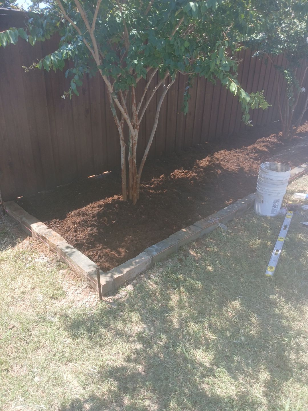Landscape using Crepe Myrtle Plant by Clays Services Inc