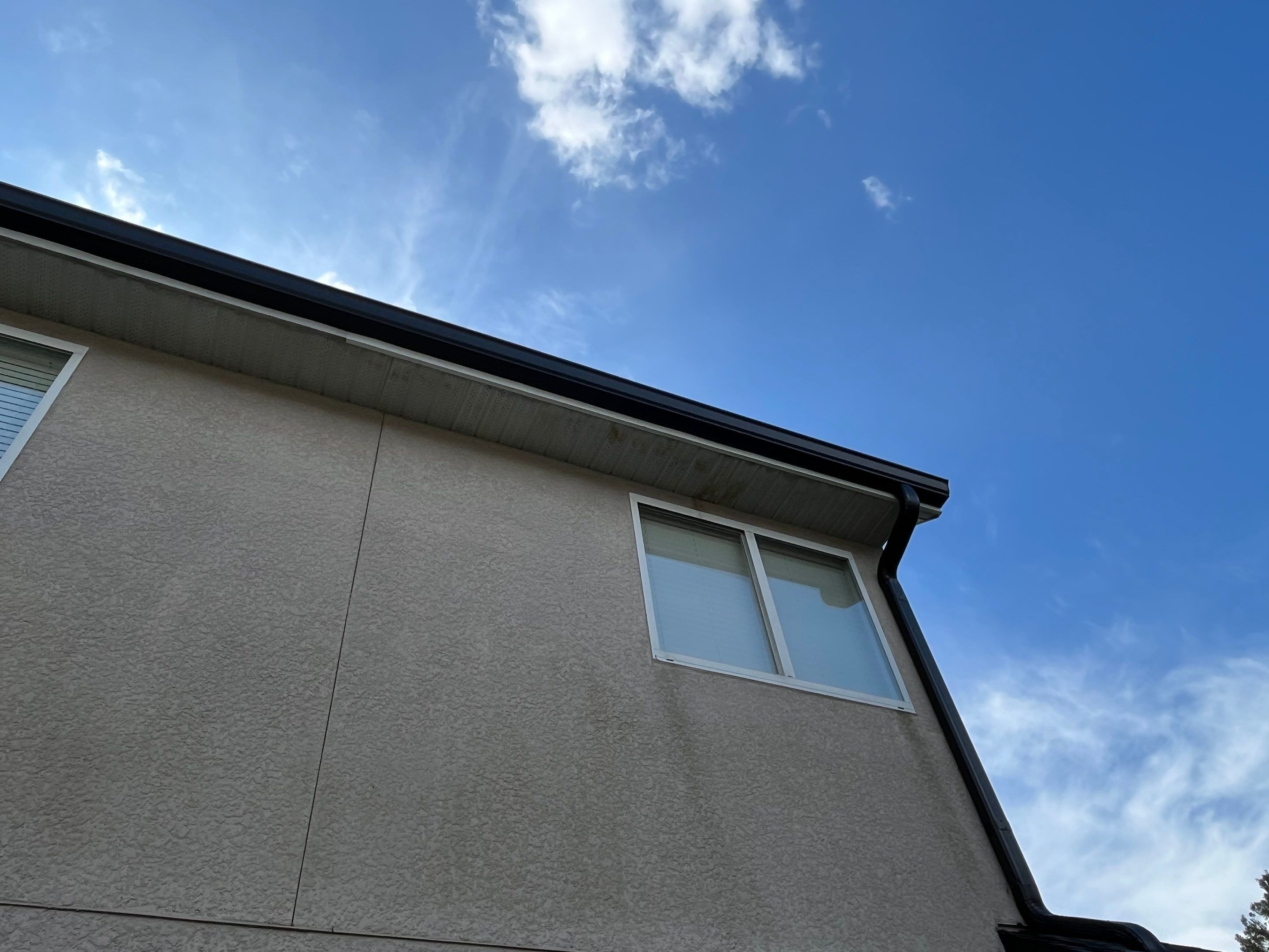 Black 6-inch Seamless Gutters for Modern Ellenton Homes FL by Gutter Professors