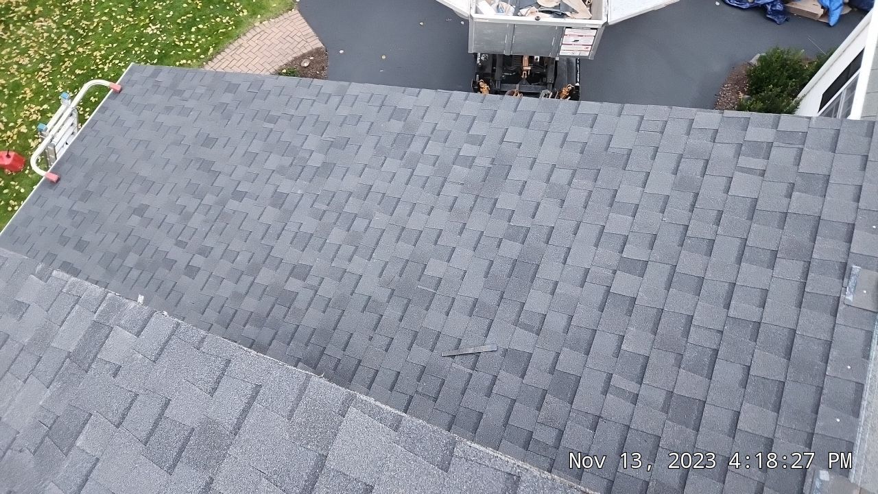 Residential Roofing Installation using Certainteed Landmark Moire Black by A Plus Exterior