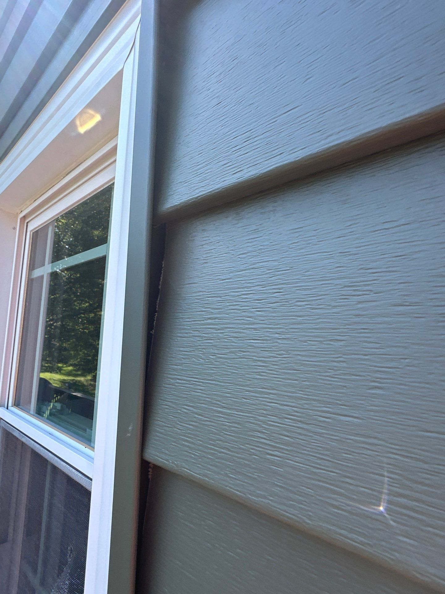 New Craneboard Siding on this Platte City, Mo home  by EEC  Windows, Siding & Roofing 