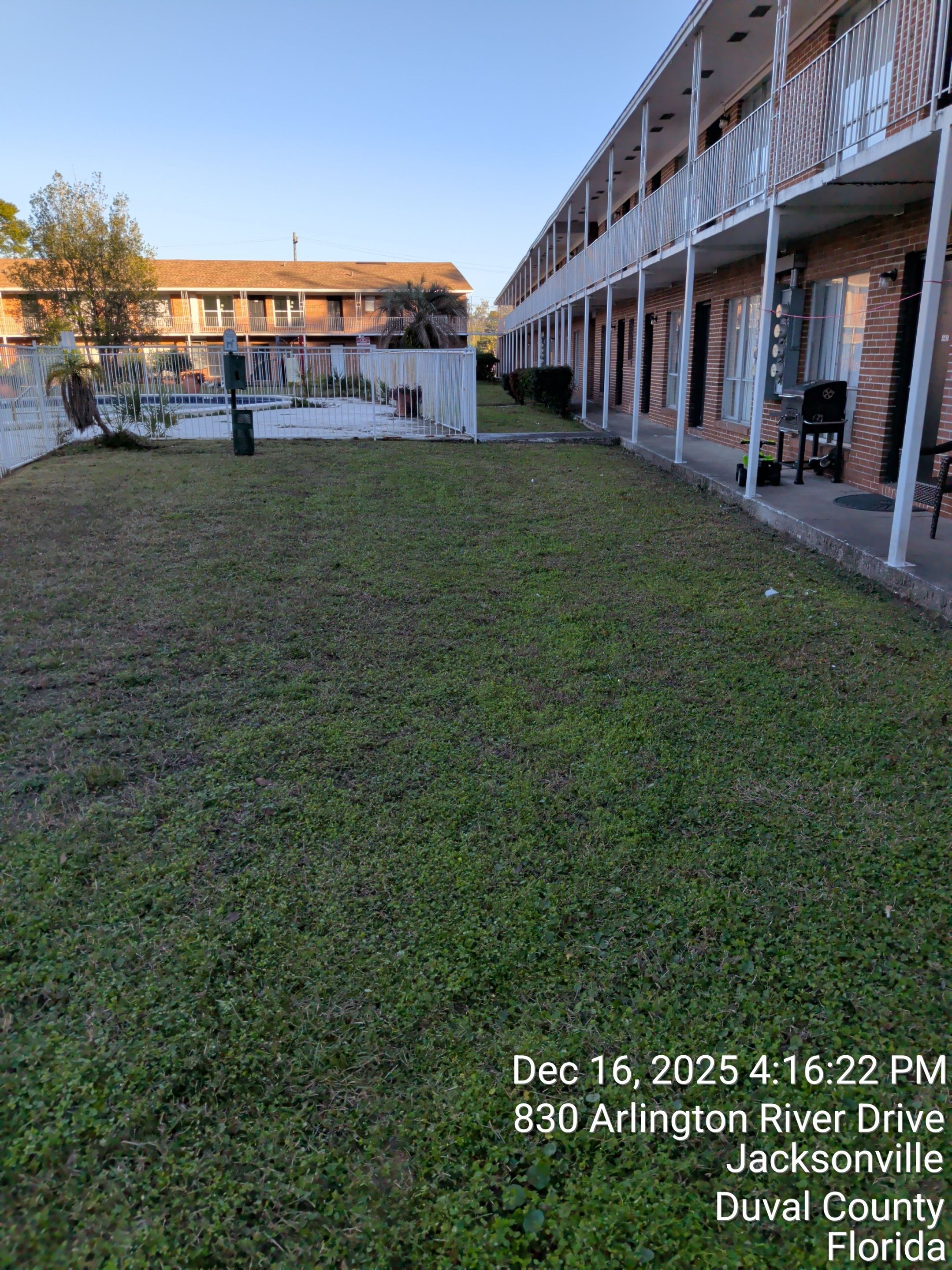 Apartment Landscape Cleanup & Ongoing Grounds Maintenance — Cimarron Apartments (Arlington) by Harmoni Home Services