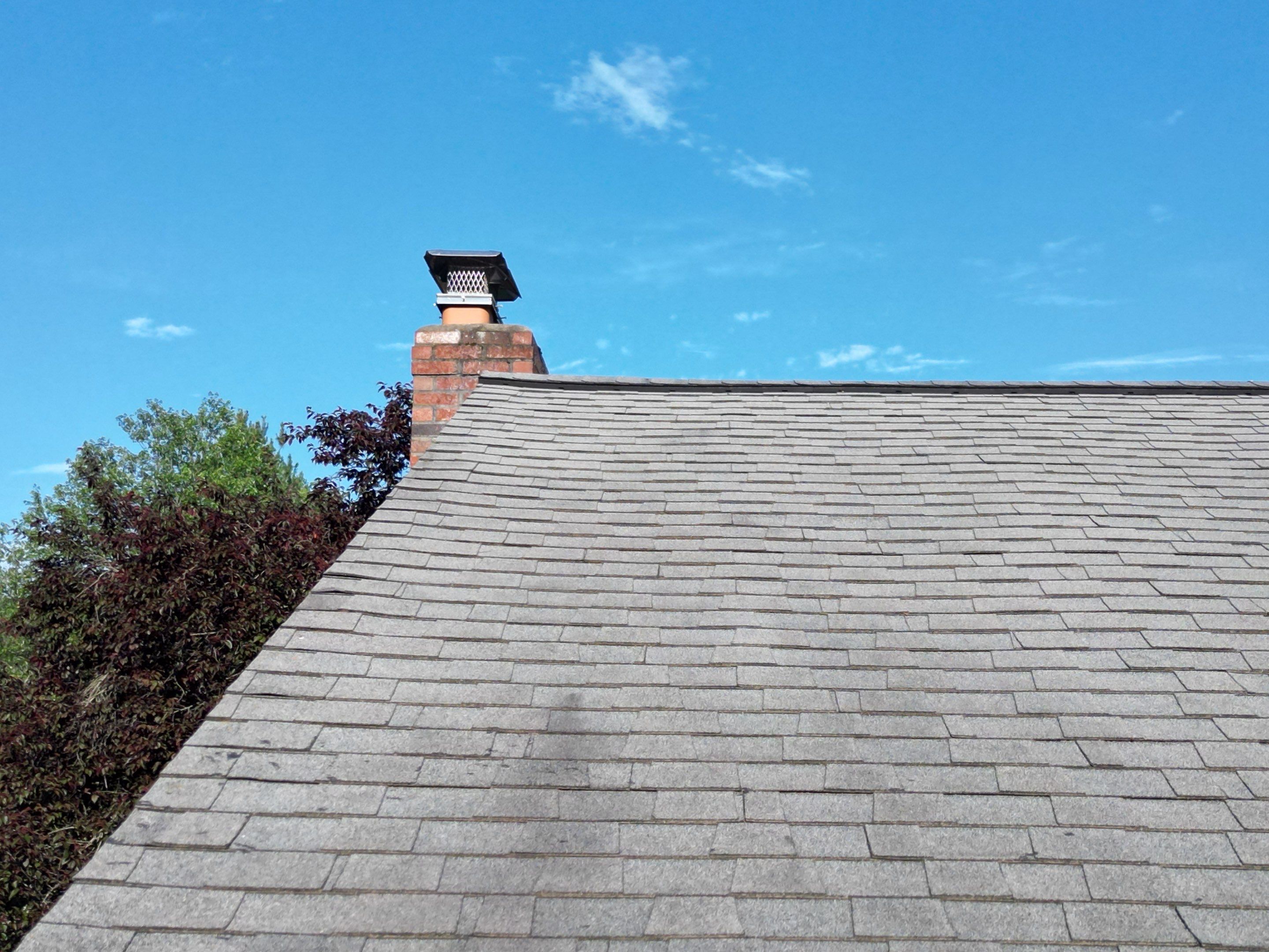 Complete Roof Replacement with Chimney Flashing, Gutter Guard System, and Vinyl Siding Repairs by Mighty Dog Roofing of Greater Middlesex County