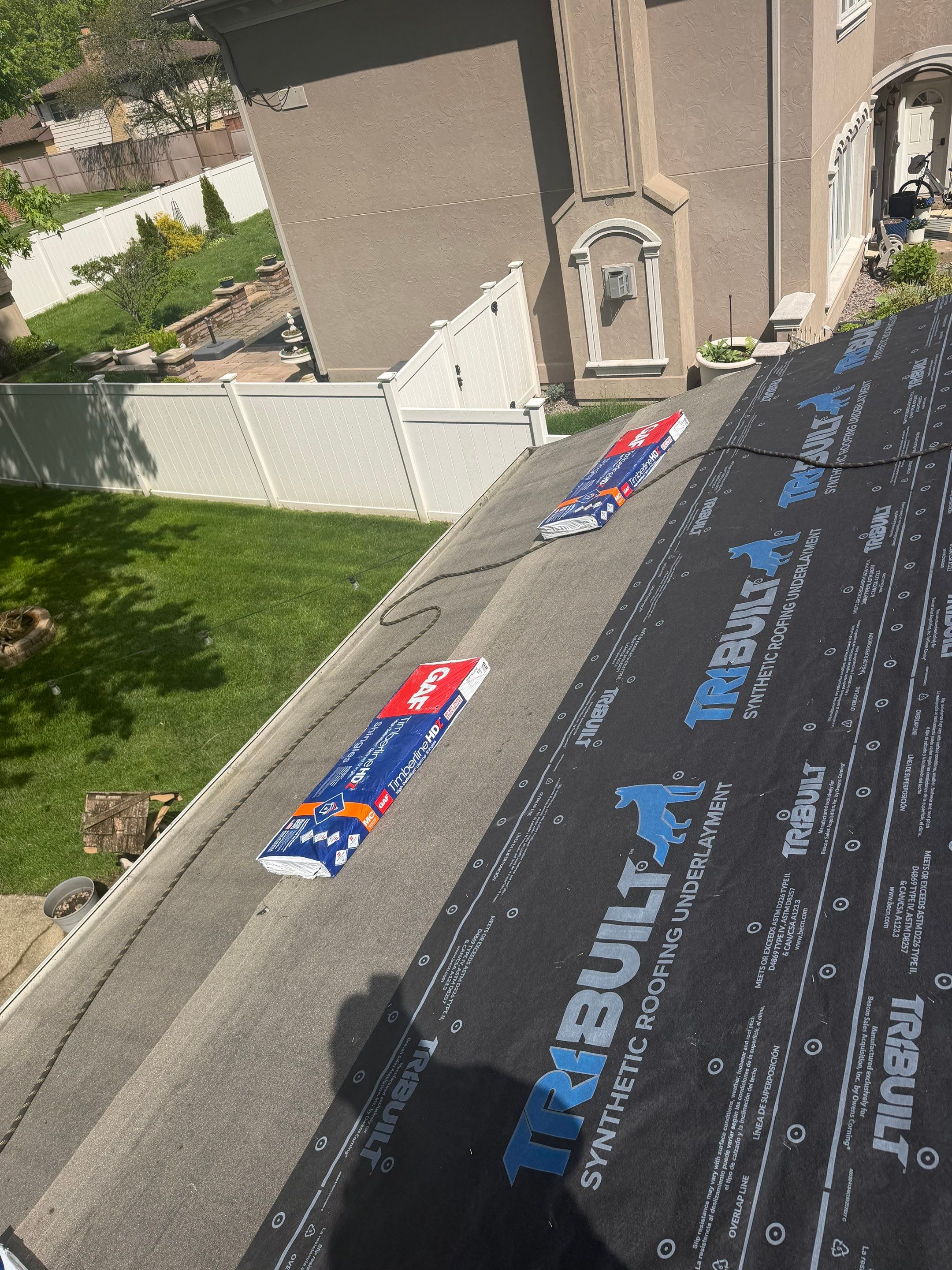 Roof replacement and chimney flashing by Optimal Home Improvement 