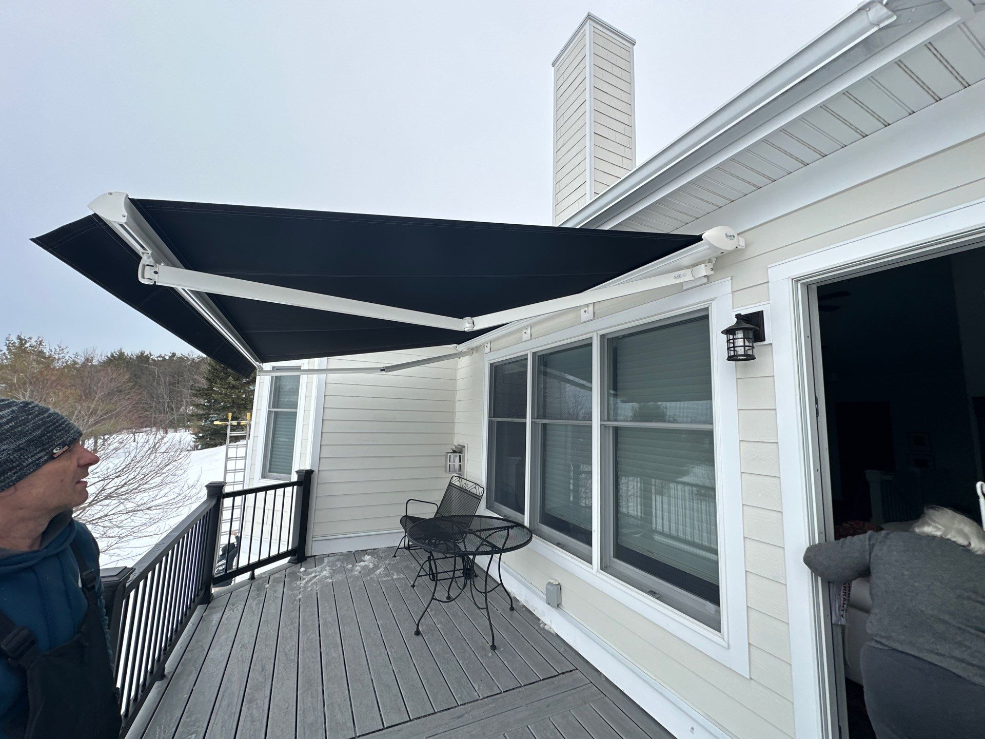 Sunesta Retractable Awning Installation in Harbor Springs by Rainbow Seamless Systems