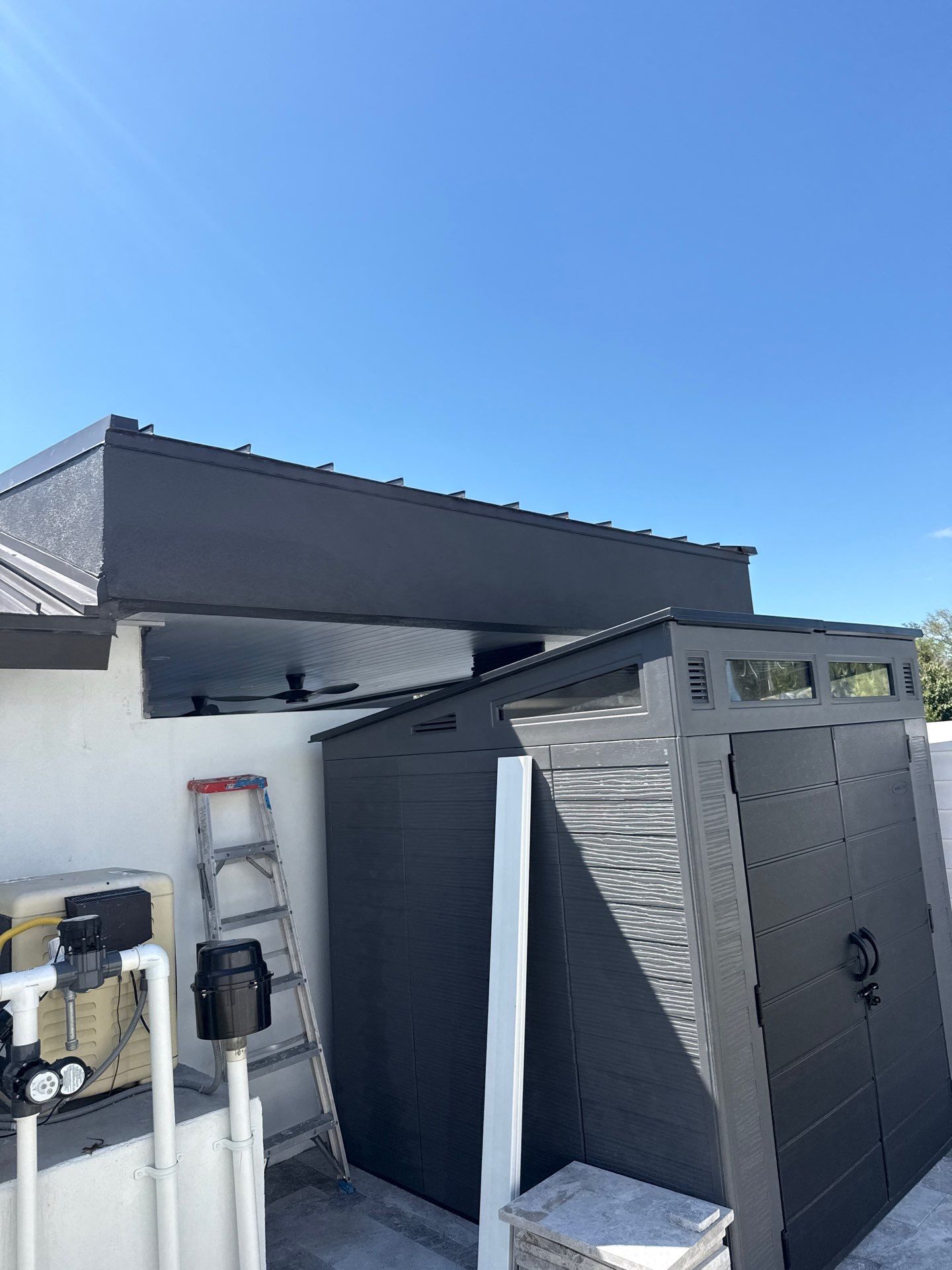 7-Inch Smooth Box Seamless Gutters using black seamless gutters in Siesta Key Fl by Gutter Professors