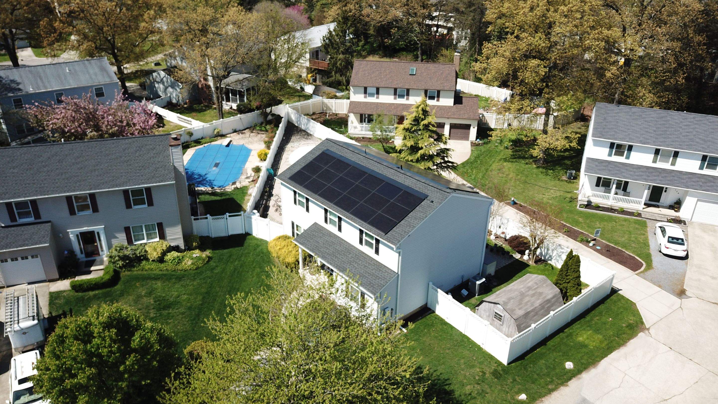 Roof Replacement with GAF Decotech integrated solar panels by American Home Contractors