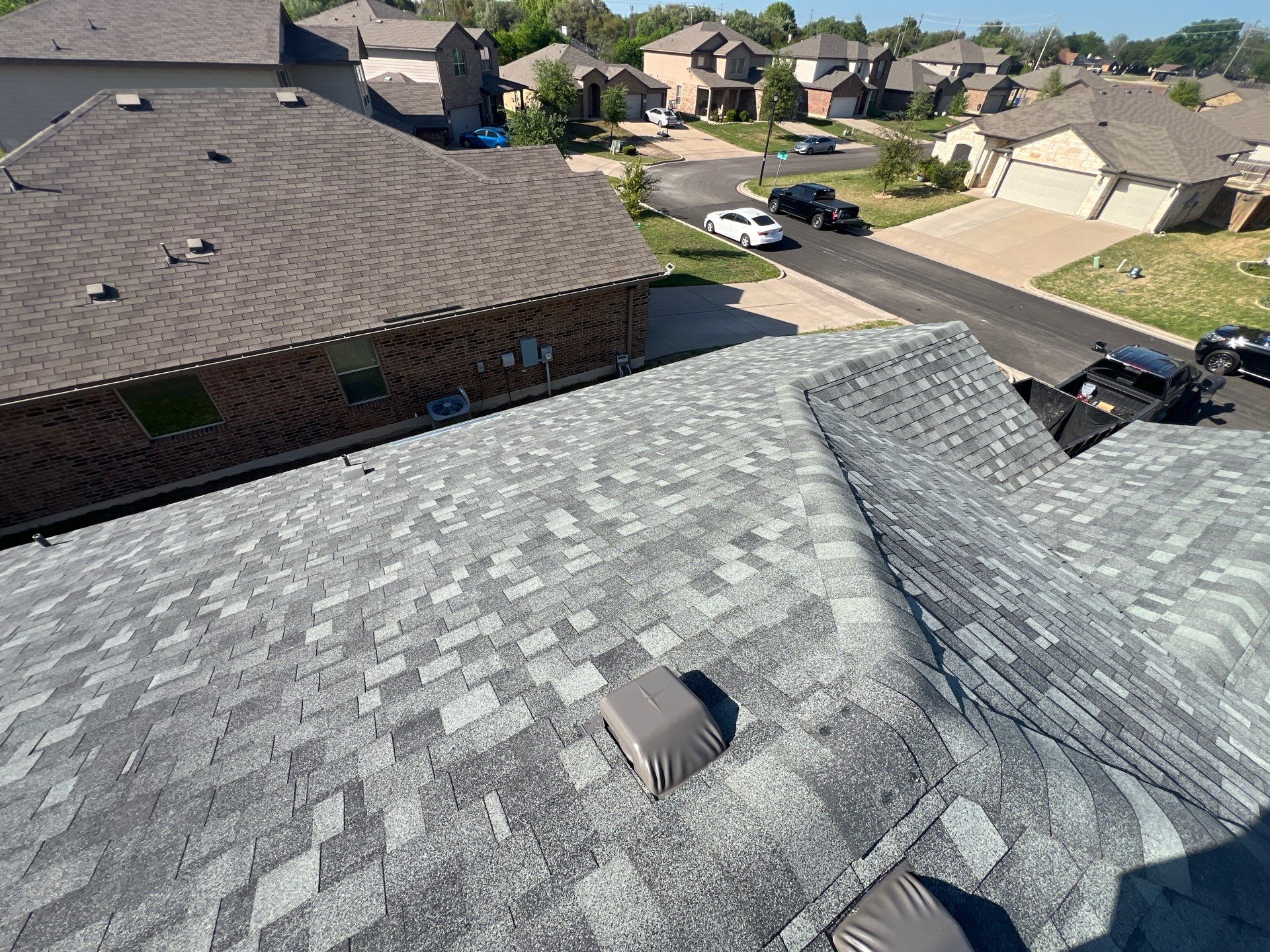 Residential Roofing Installation using IKO Nordic Class 4 Impact Resistant 30yr Architectural Shingles. Color: Castle Grey by WR Roofing Solutions