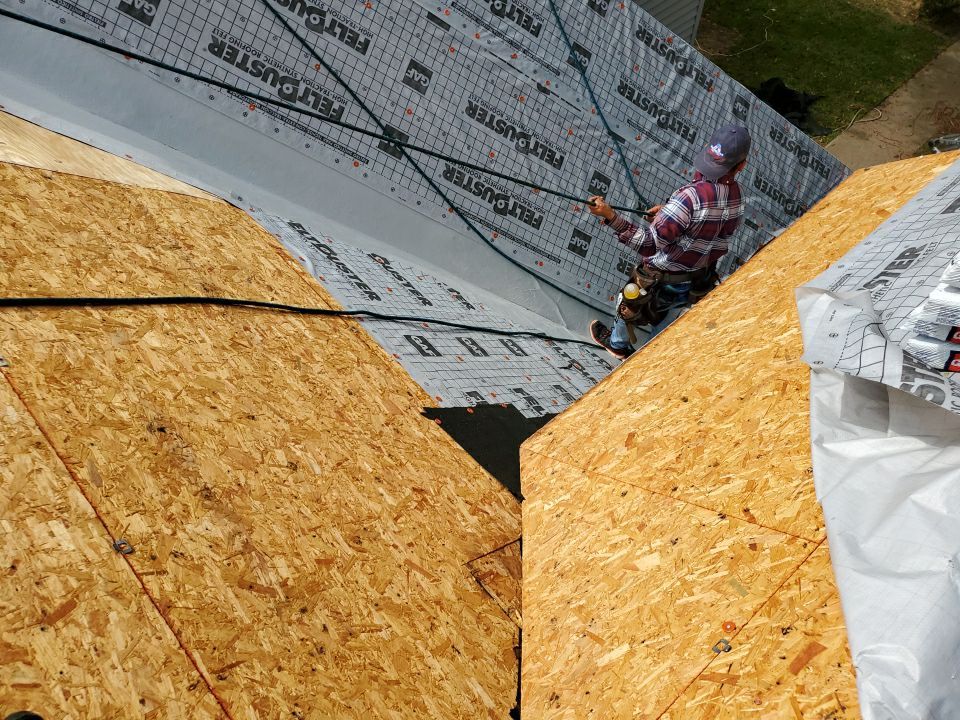 Residential Roofing Installation using Roof Replacement by American Roofing & Construction LLC