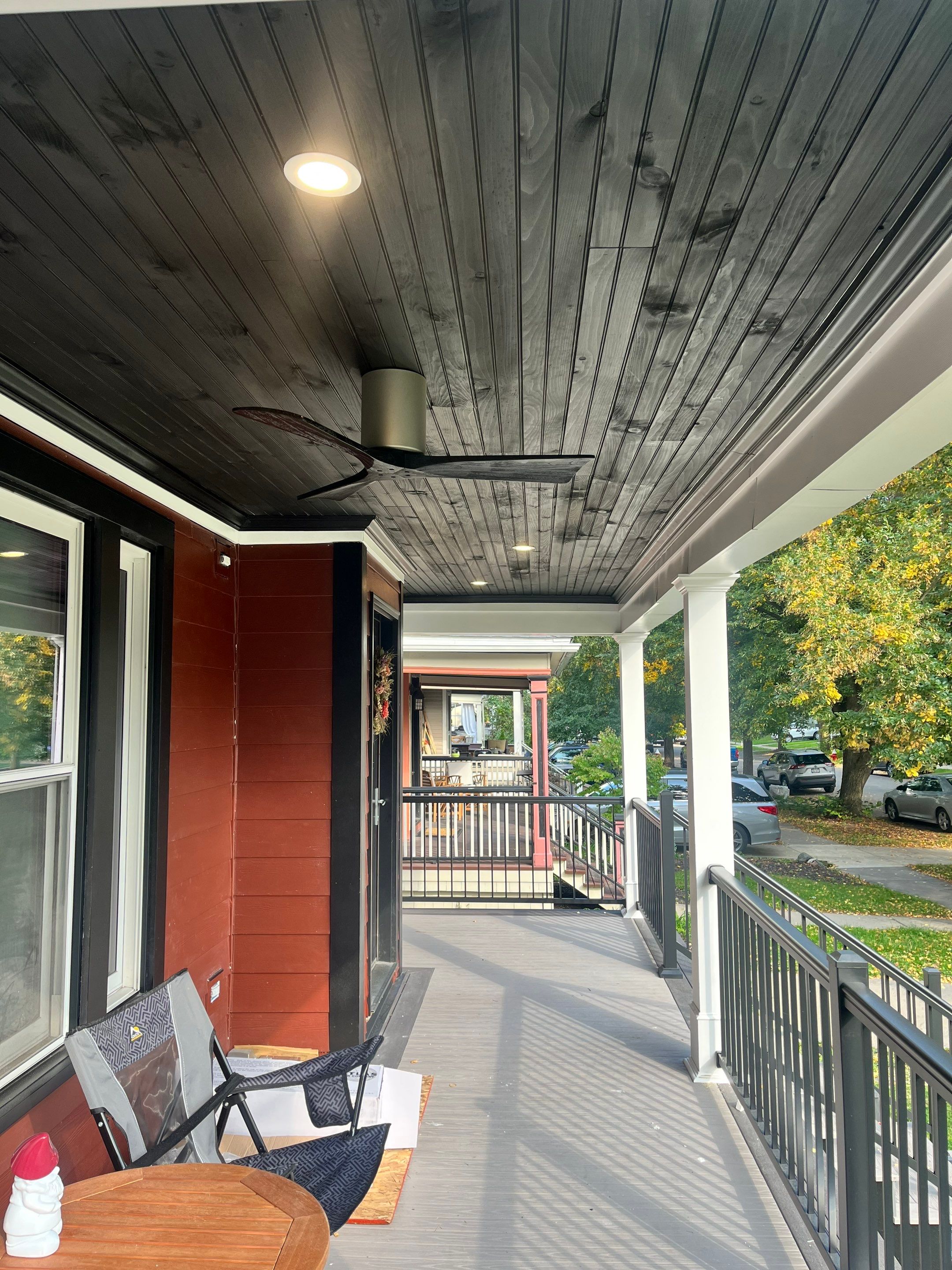 Exterior Renovations- Siding, Stamped Concrete, Porch, and Railings by Ivy Lea Construction