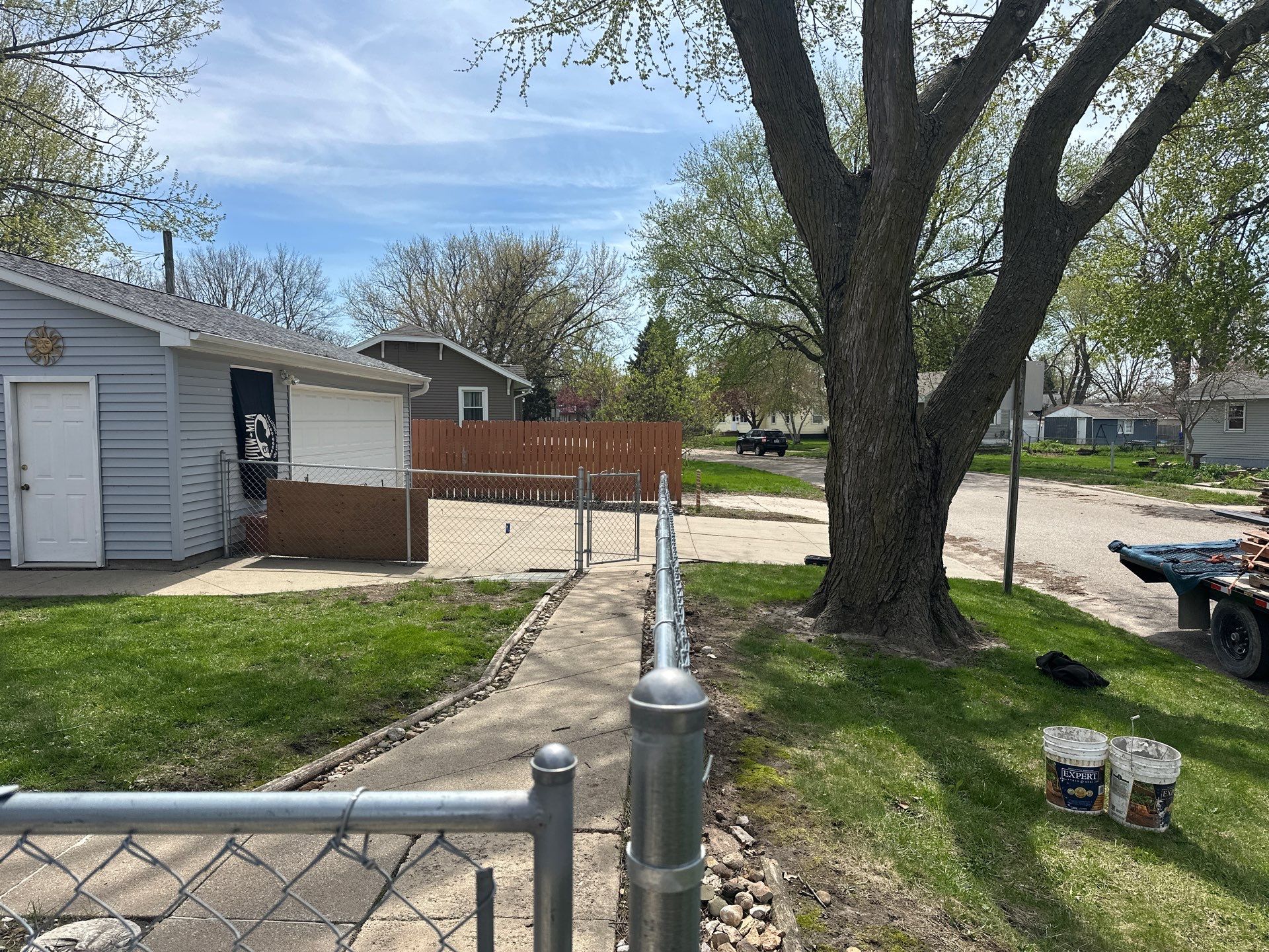 Black Chain Link Fence Installation for Waterloo Residential Backyard by Perfect Picket Fence and Stain