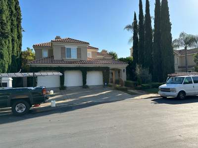 Roof wash on this dirty roof covered in algae