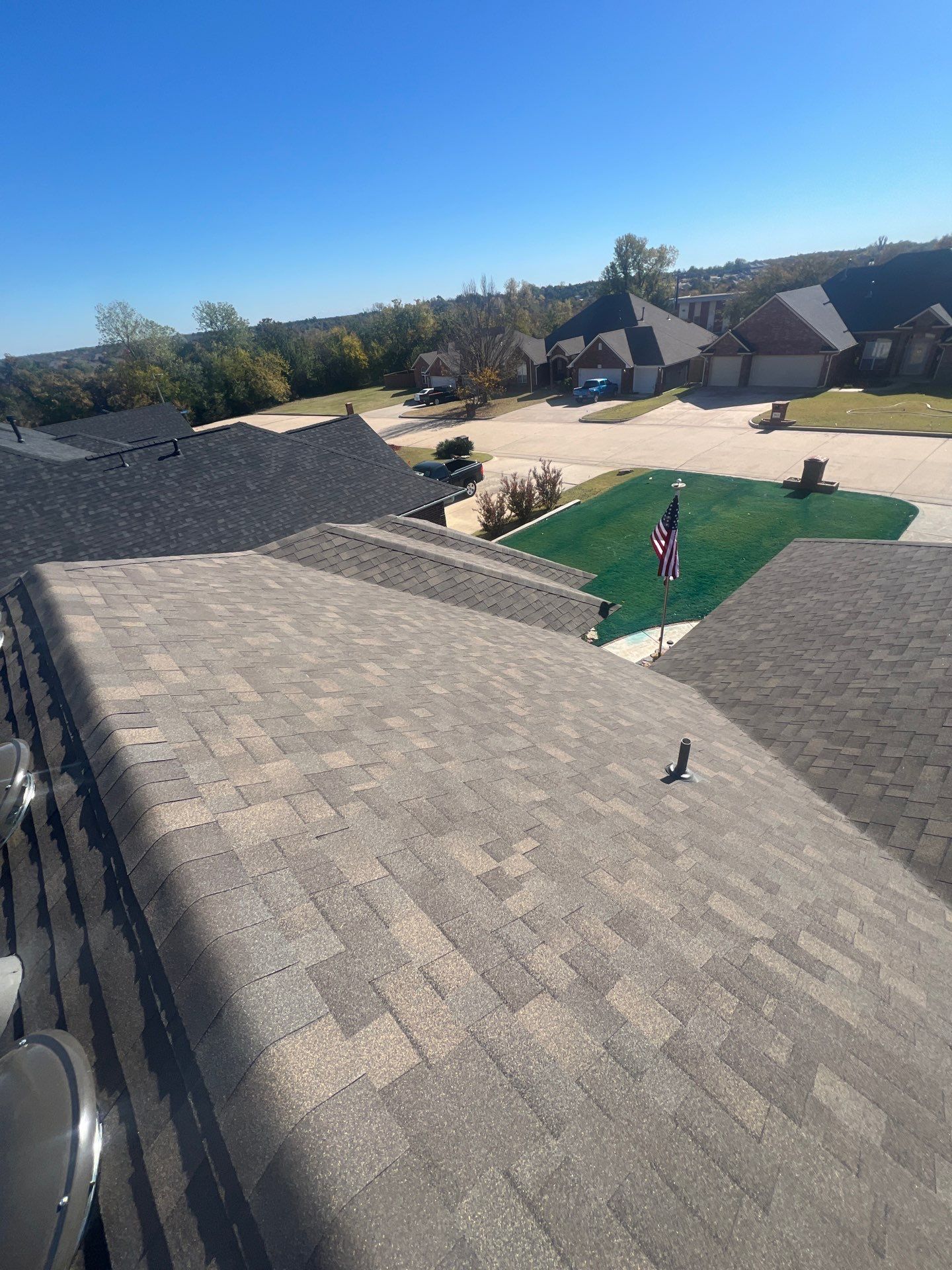 roof replacement & gutter installation in Midwest City by McCann's Roofing and Construction