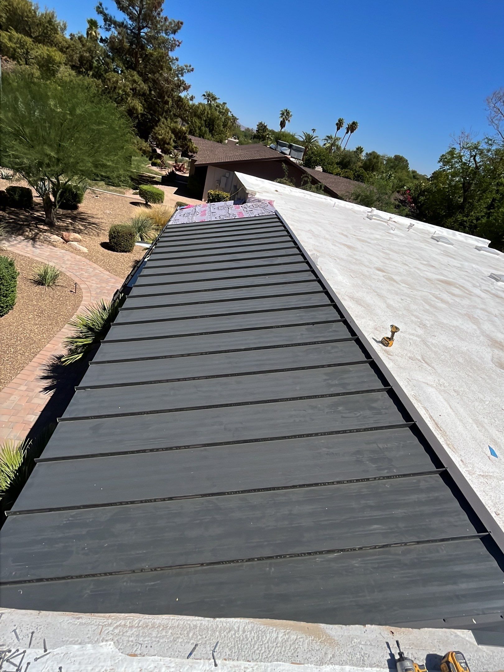 Charcoal Gray Standing Seam by Reimagine Roofing