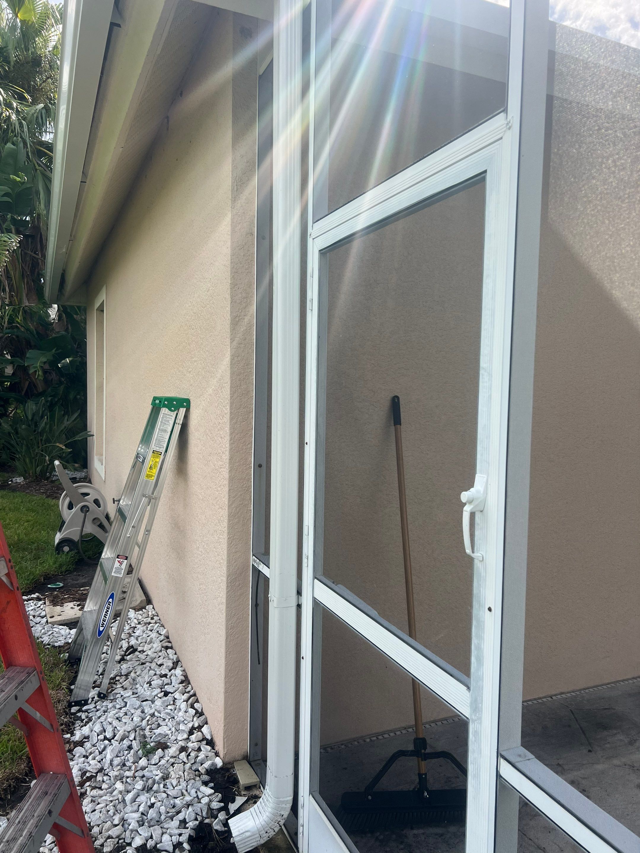 White Gutters and White Downspouts by Gutter Professors