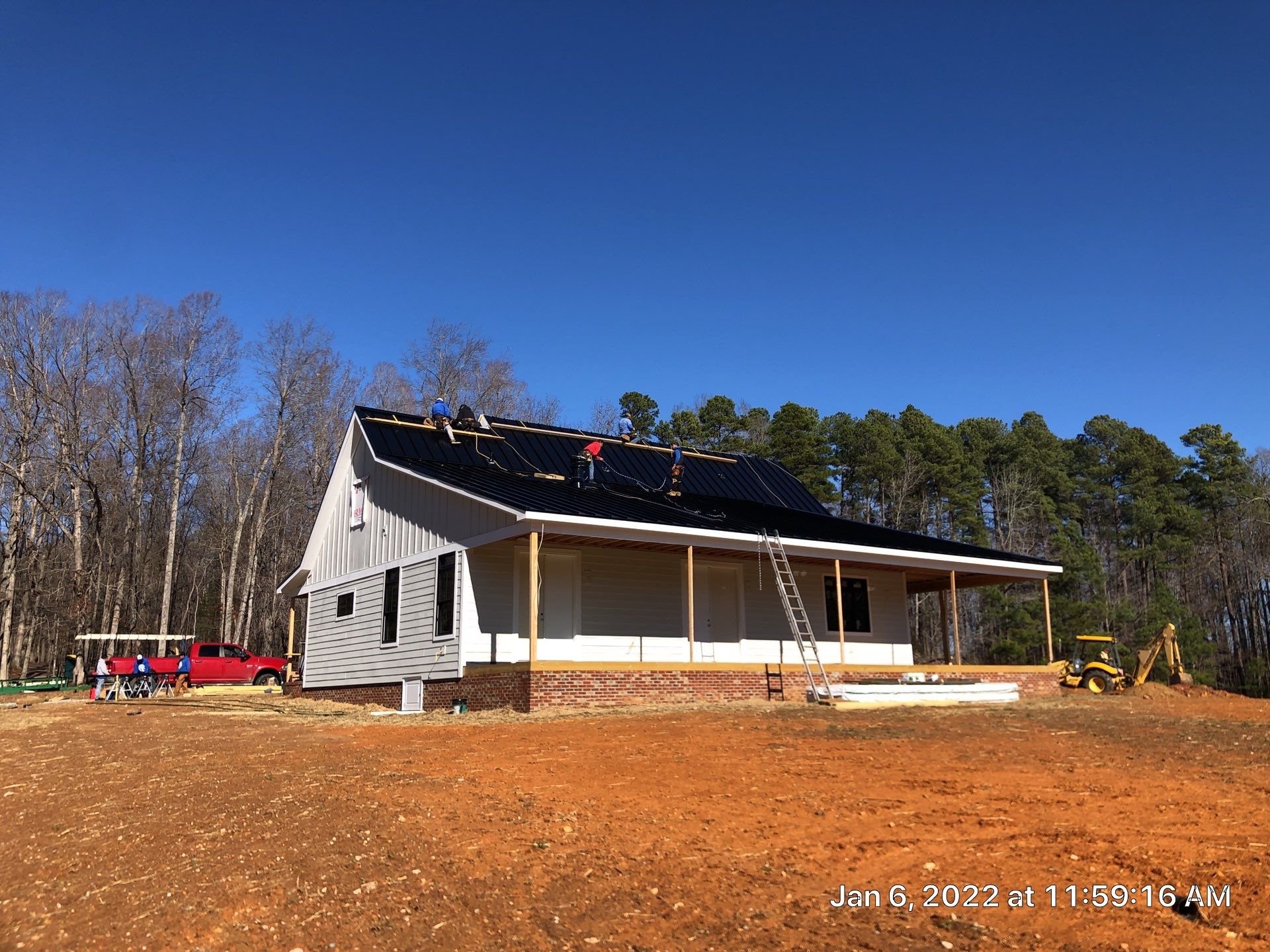 Custom Home Metal Roof Installation by Just In Time Roofing and Restoration