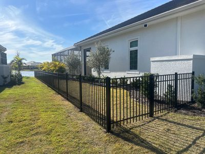 Aluminum Fence Installation using Black 3 Rail Aluminum Fence