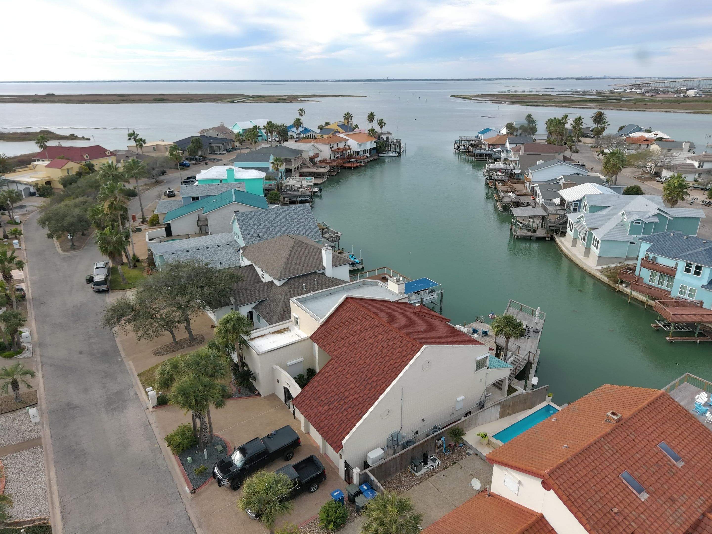 Off with the Tile and on with the TILCOR stone coated metal.  by Bayfront Roofing and Construction